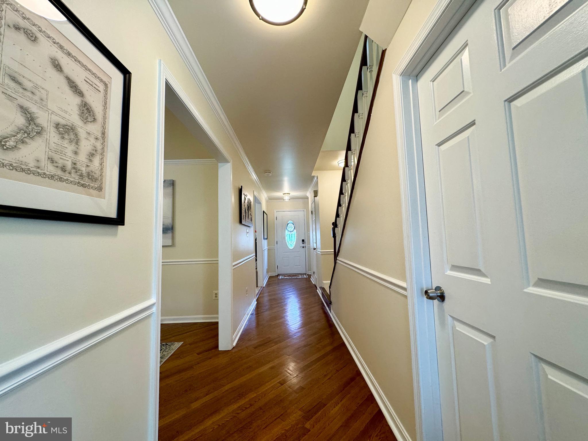 6728 Churchill Road McLean, VA 22101 - Photo 6 of 32 a view of an entryway with wooden floor