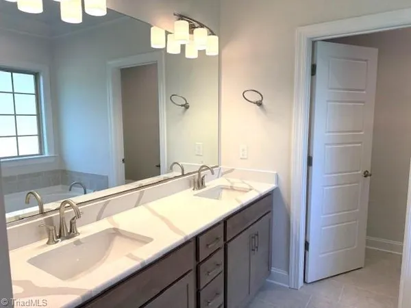 $699,990 | 7890 Maple Pond Drive, Oak Ridge, NC 27310