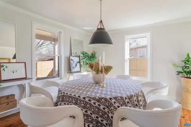 a view of a dining room with furniture