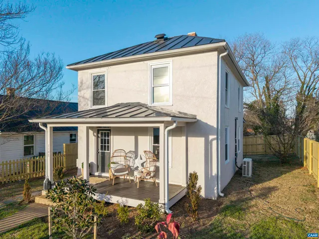 a front view of a house with a porch