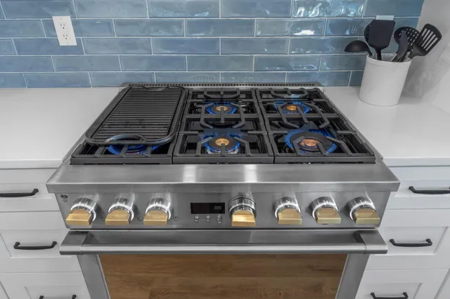 a view of staircase with white walls and a window