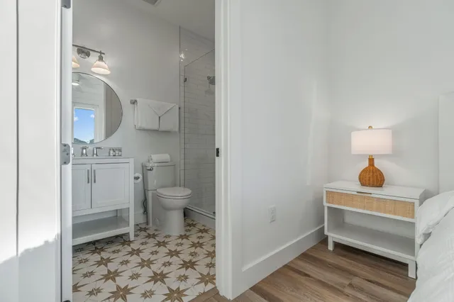 an aerial view of a residential houses with outdoor space