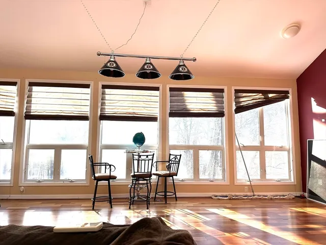 a kitchen with stainless steel appliances granite countertop a refrigerator a oven and a sink