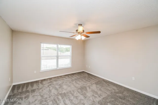 an empty room that has a window