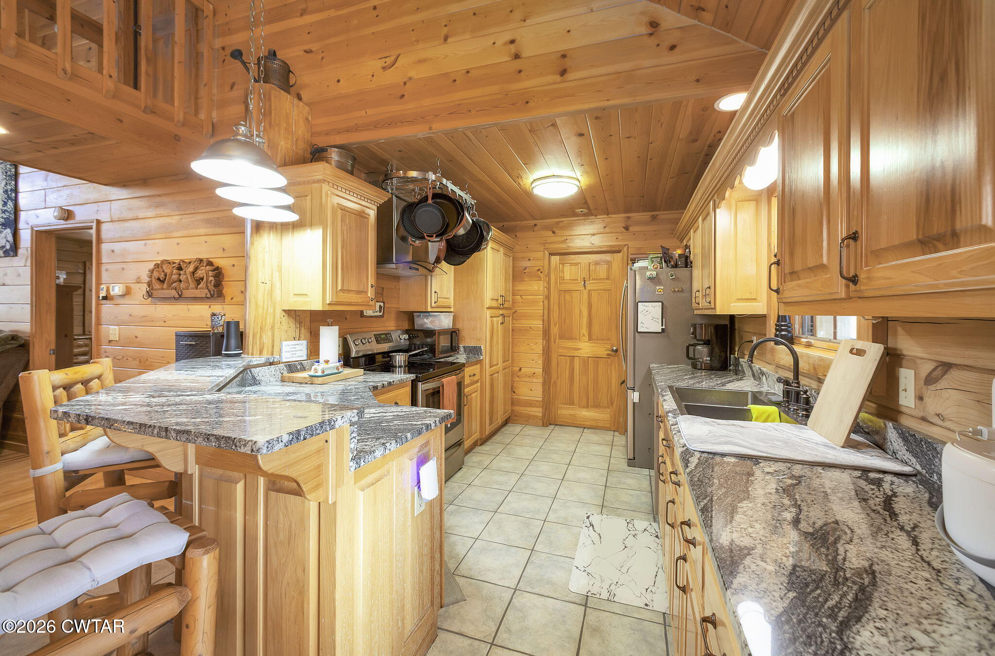 372 Aubrey Fergerson Road Gadsden, TN 38337 - Photo 12 of 50 a view of a kitchen and dining area