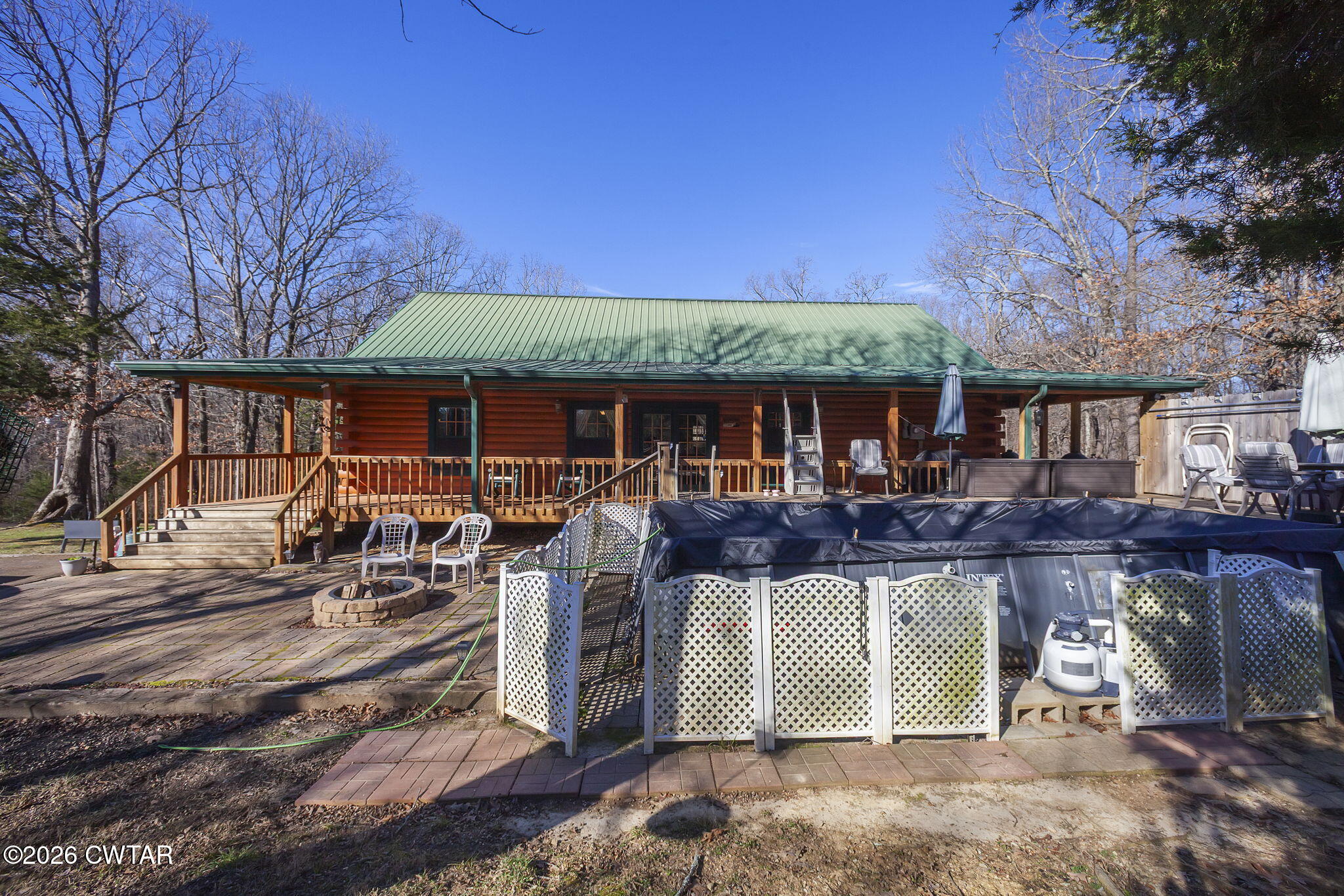 372 Aubrey Fergerson Road Gadsden, TN 38337 - Photo 36 of 50 a view of a house with backyard patio and swimming pool