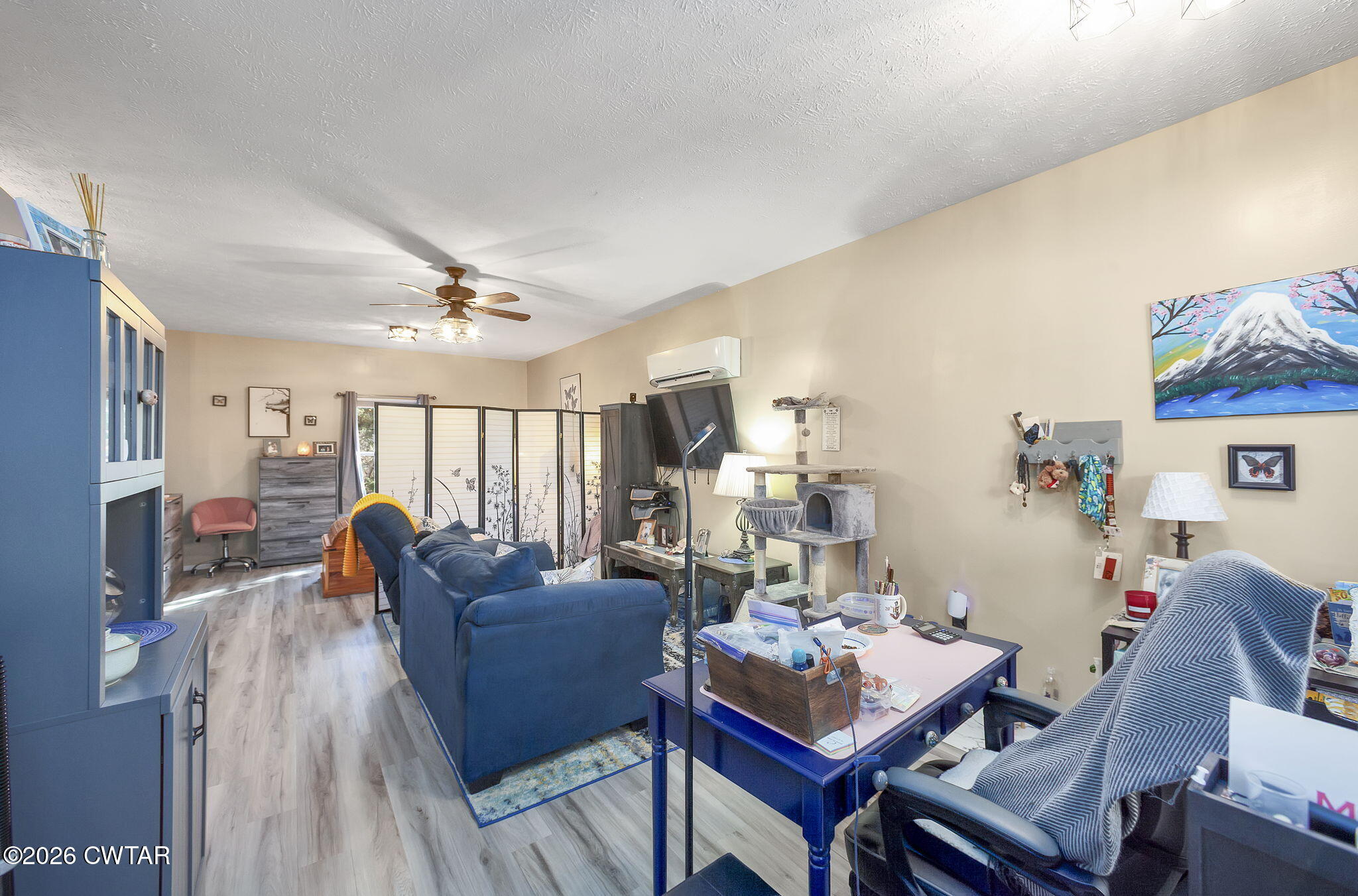 372 Aubrey Fergerson Road Gadsden, TN 38337 - Photo 43 of 50 a living room with furniture and a wooden floor