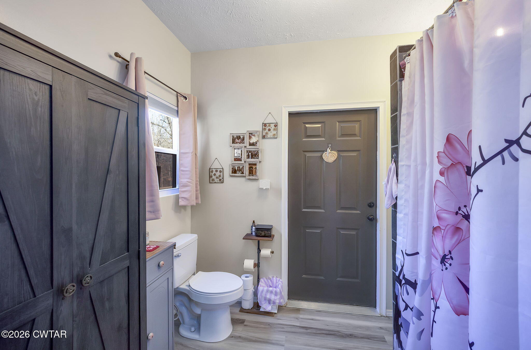 372 Aubrey Fergerson Road Gadsden, TN 38337 - Photo 45 of 50 a bathroom with a toilet and a shower