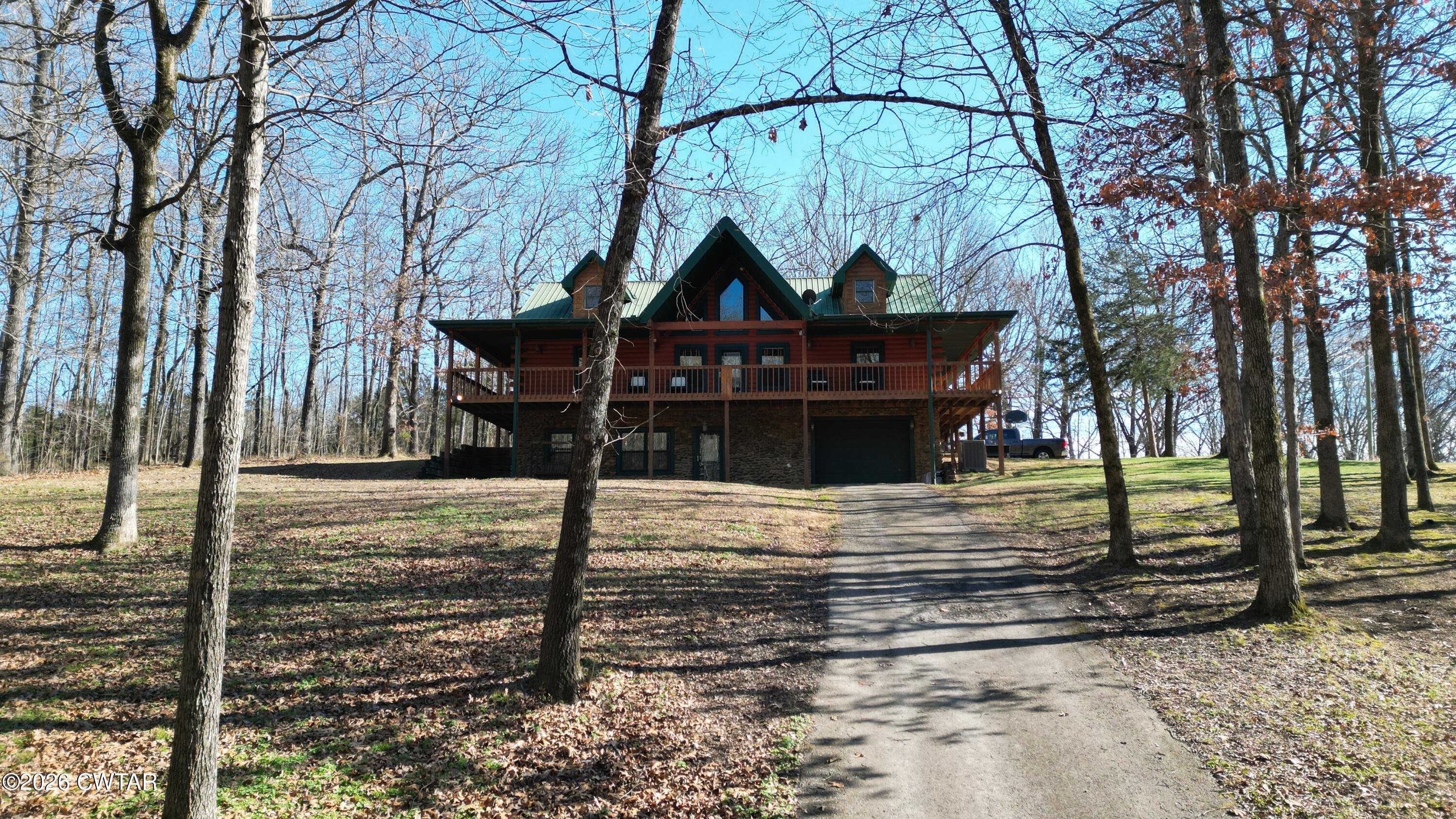 372 Aubrey Fergerson Road Gadsden, TN 38337 - Photo 5 of 50 a view of a house with large windows