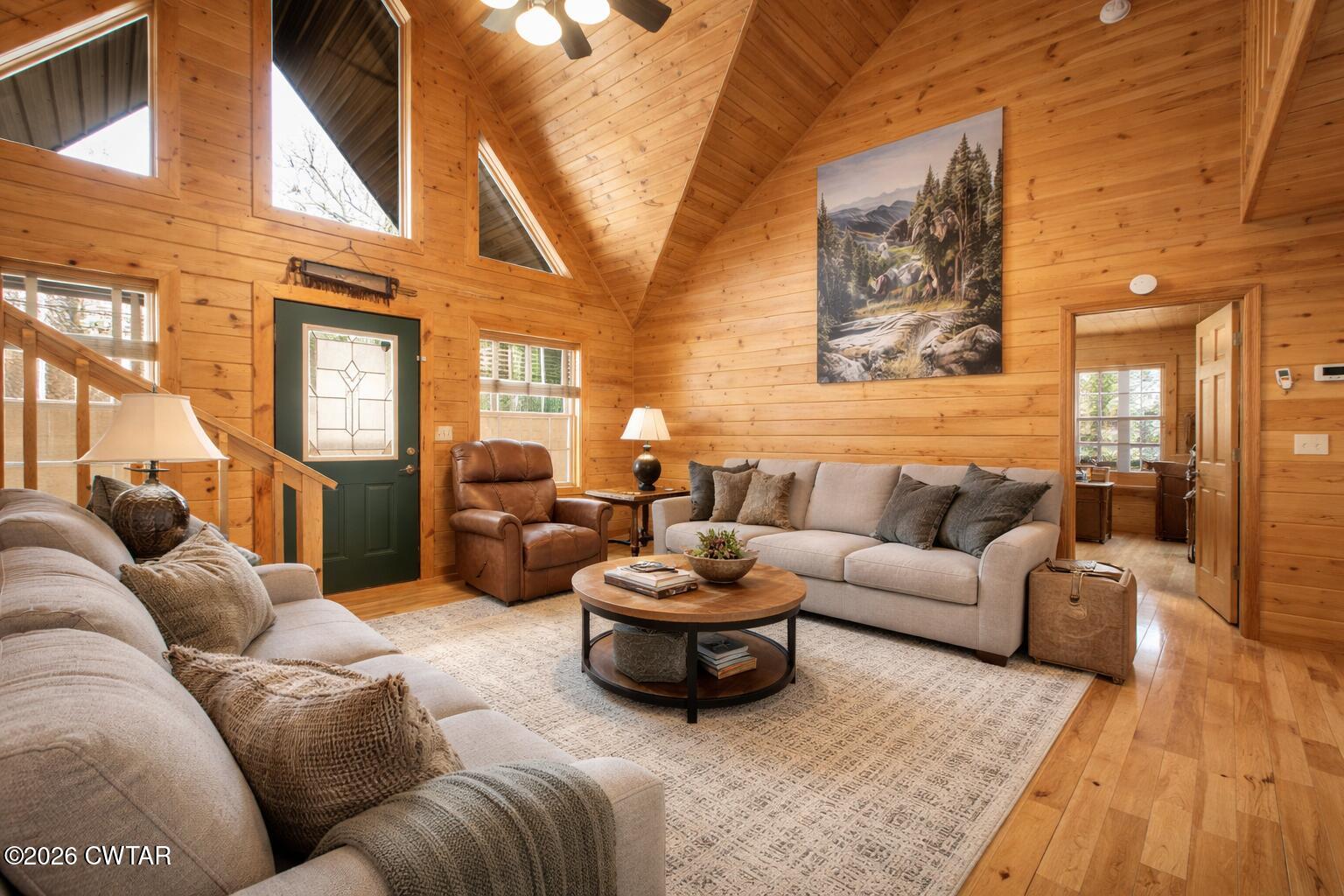 372 Aubrey Fergerson Road Gadsden, TN 38337 - Photo 10 of 50 a living room with furniture ceiling fan and a rug