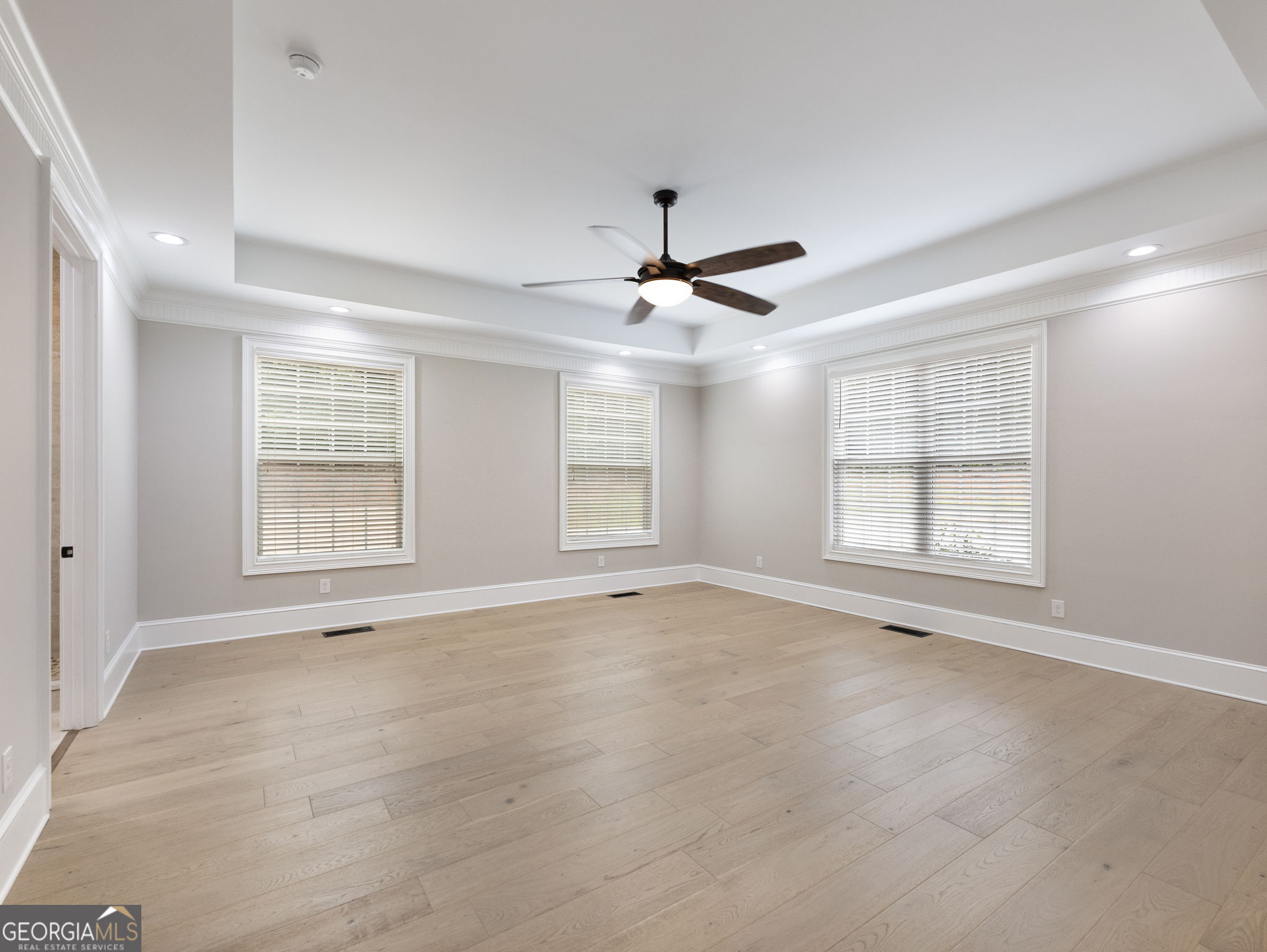 125 Iron Horse Trail Lula, GA 30554 - Photo 13 of 86 a view of an empty room with a window