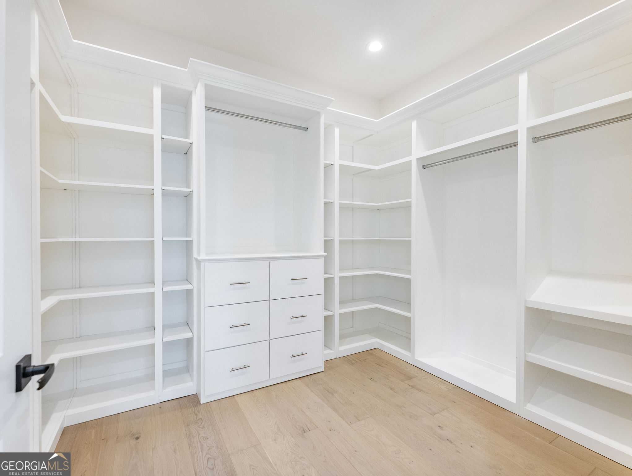 125 Iron Horse Trail Lula, GA 30554 - Photo 18 of 86 a view of an empty walk in closet