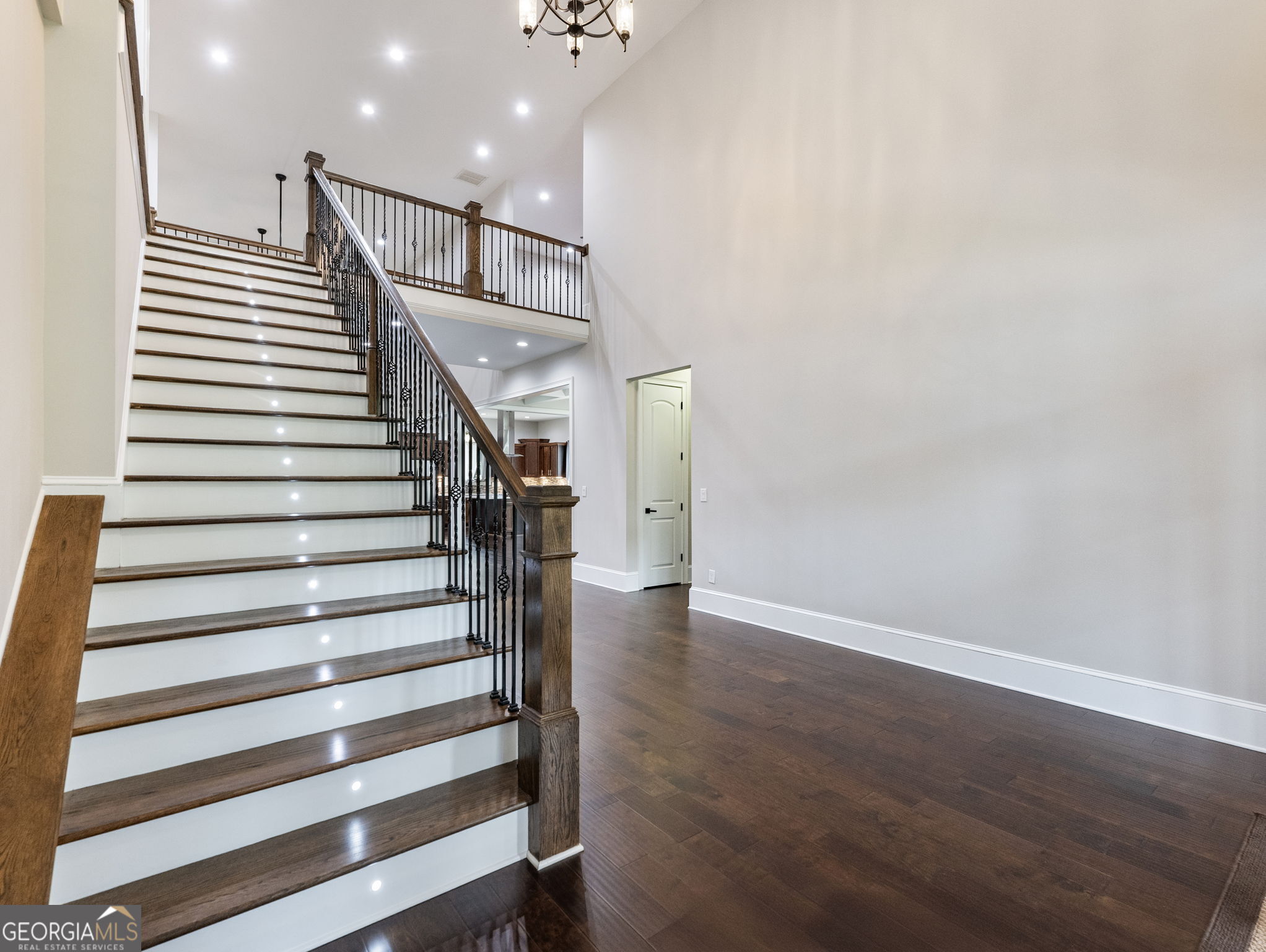 125 Iron Horse Trail Lula, GA 30554 - Photo 26 of 86 a view of entryway with wooden floor