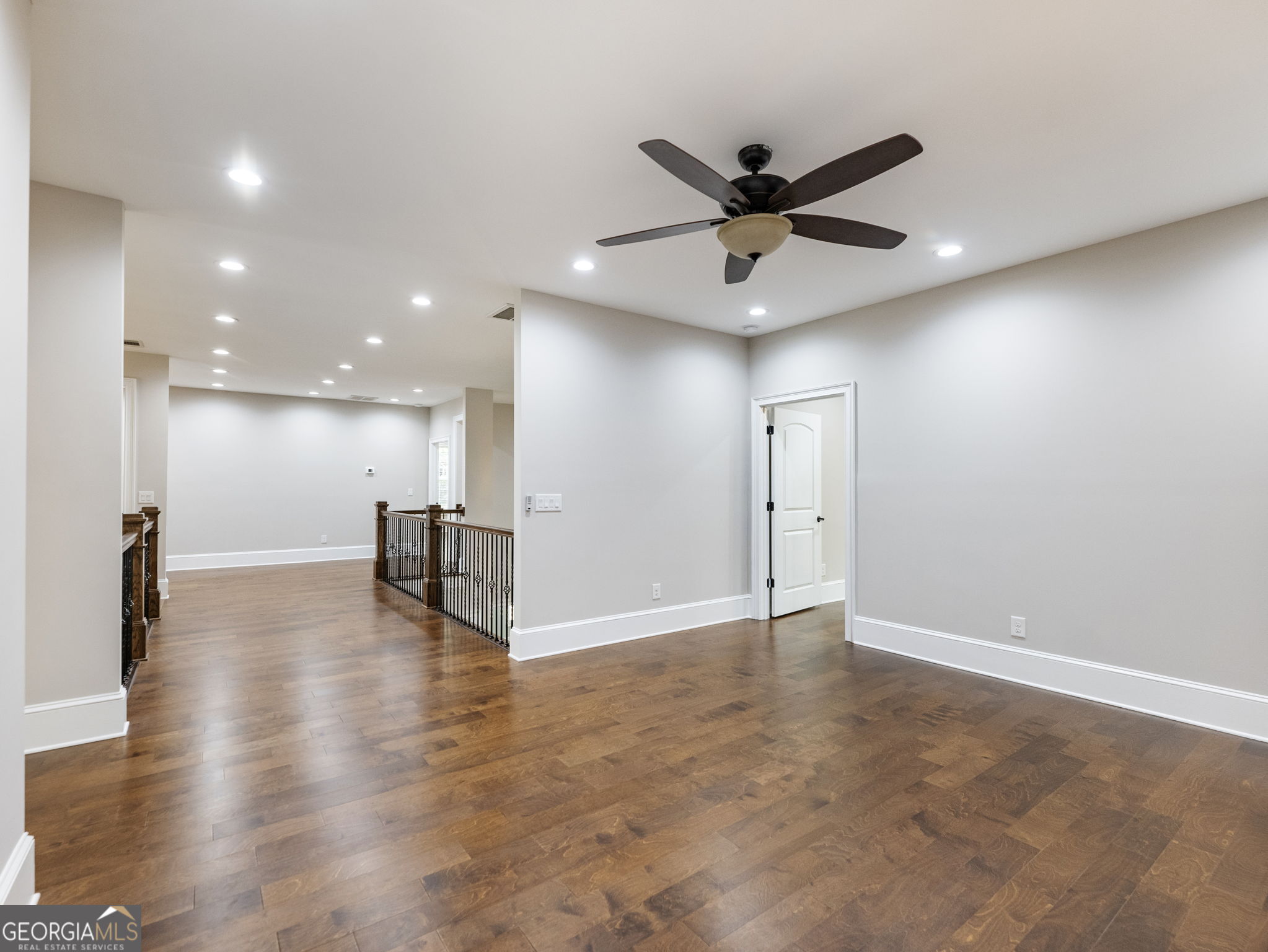 125 Iron Horse Trail Lula, GA 30554 - Photo 32 of 86 a view of an empty room with a ceiling fan