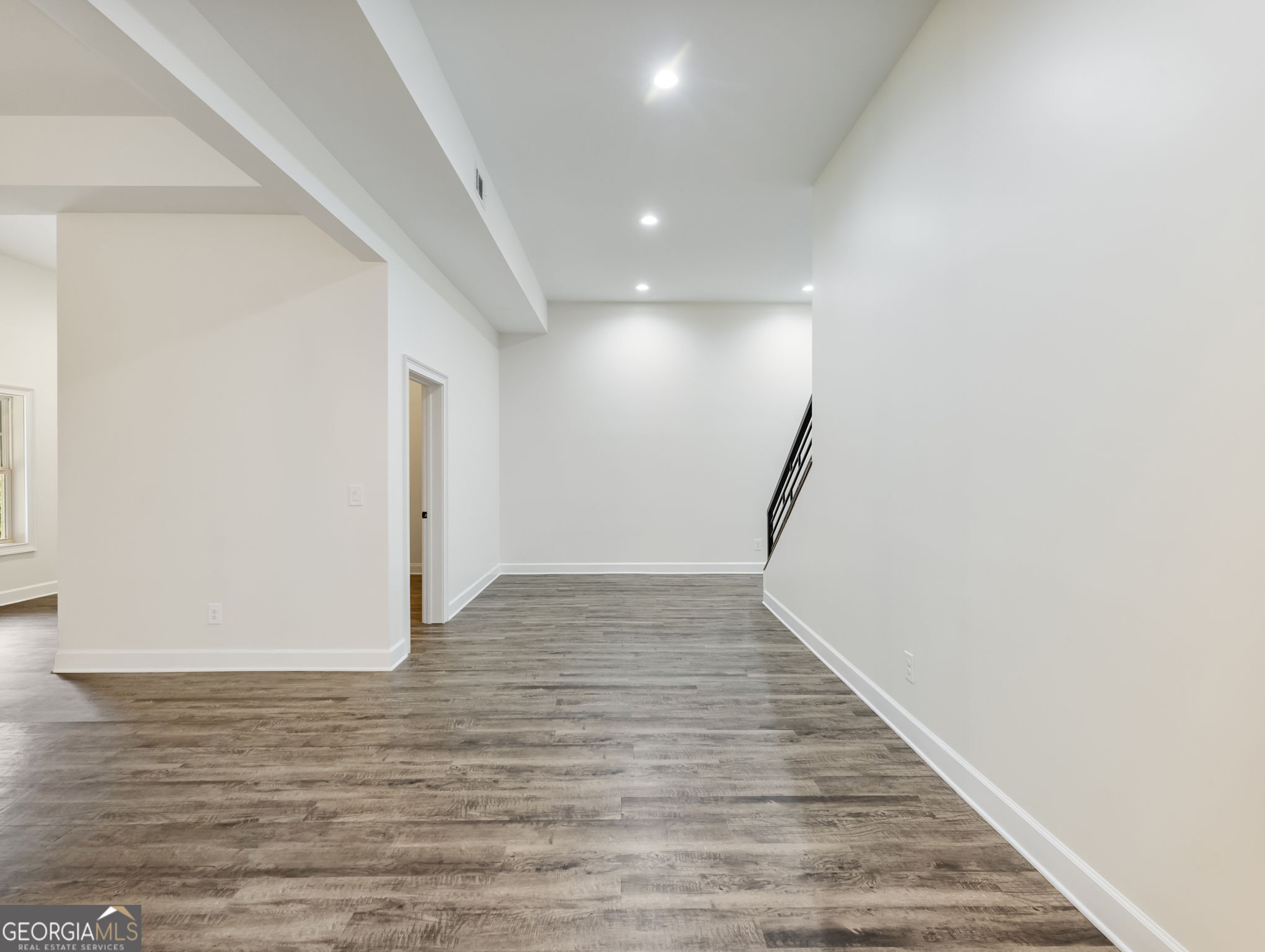 125 Iron Horse Trail Lula, GA 30554 - Photo 51 of 86 a view of empty room with wooden floor