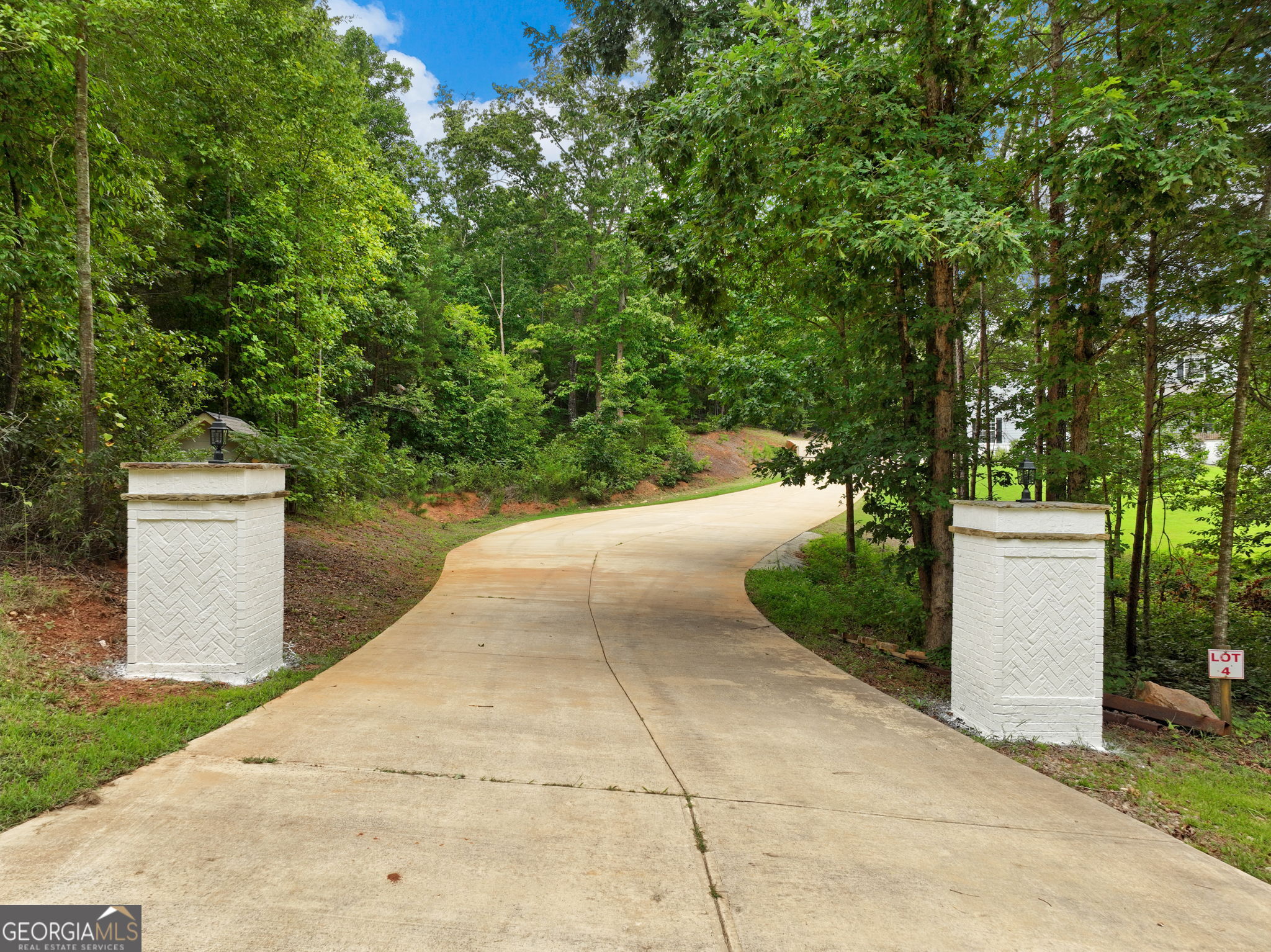 125 Iron Horse Trail Lula, GA 30554 - Photo 67 of 86 a view of a pathway of a building