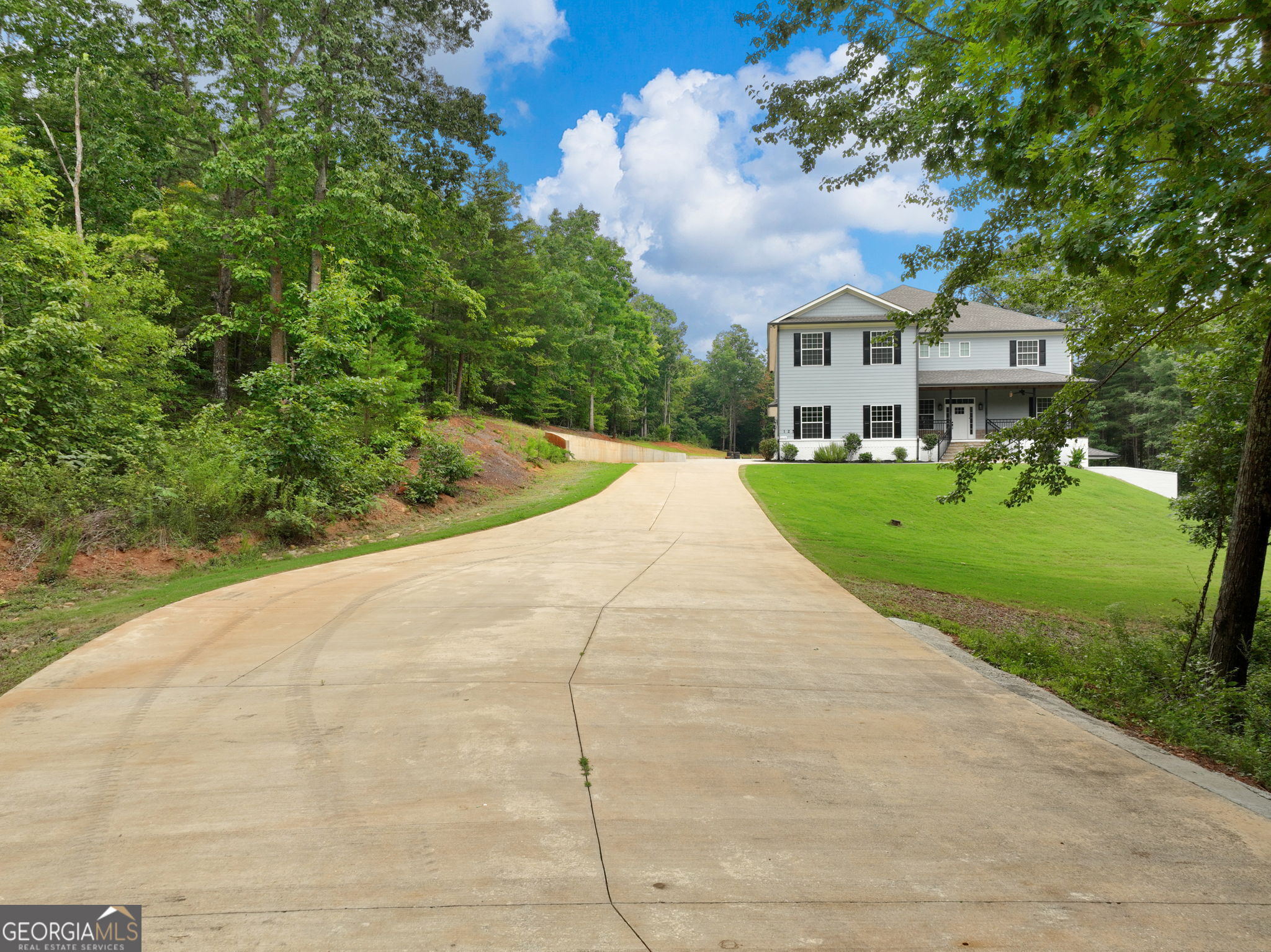 125 Iron Horse Trail Lula, GA 30554 - Photo 68 of 86 a front view of a house with a yard