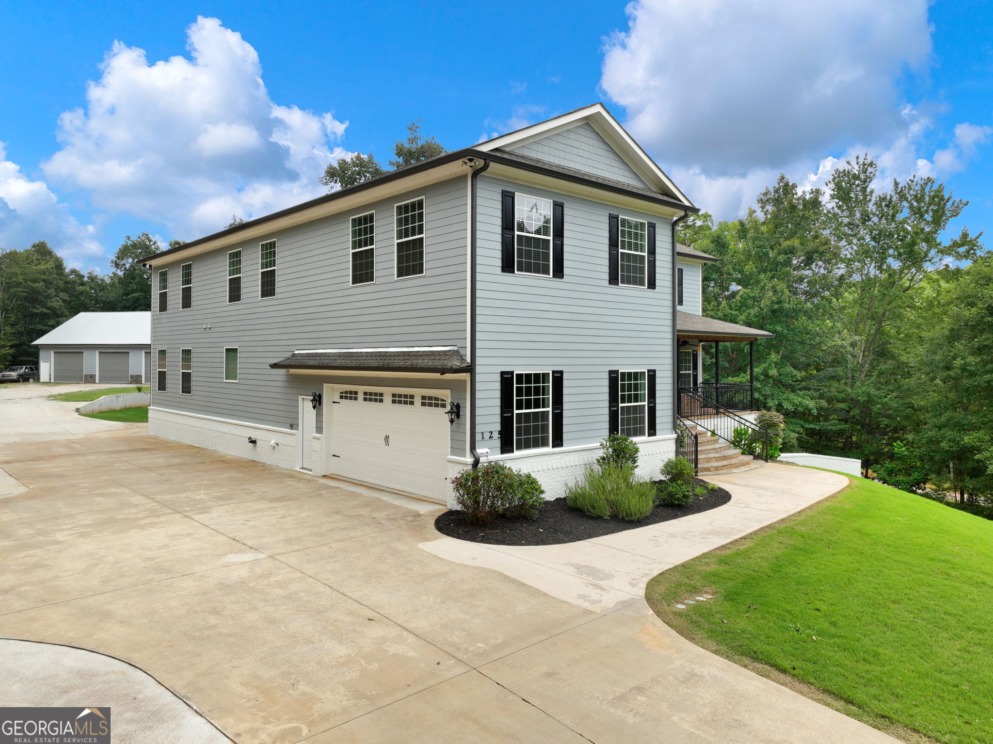 125 Iron Horse Trail Lula, GA 30554 - Photo 72 of 86 a front view of a house with a yard