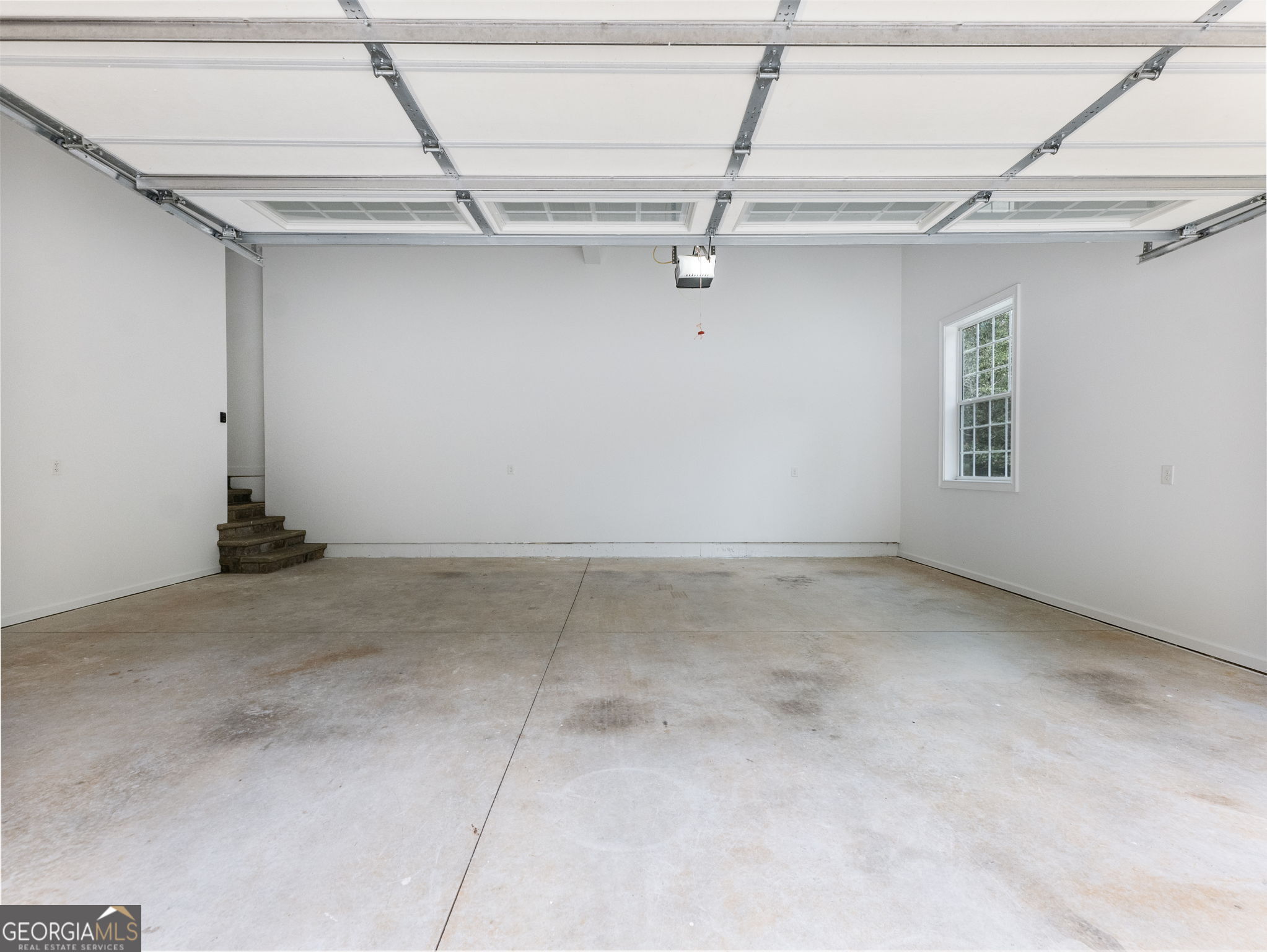 125 Iron Horse Trail Lula, GA 30554 - Photo 74 of 86 a view of a room with racks on the wall