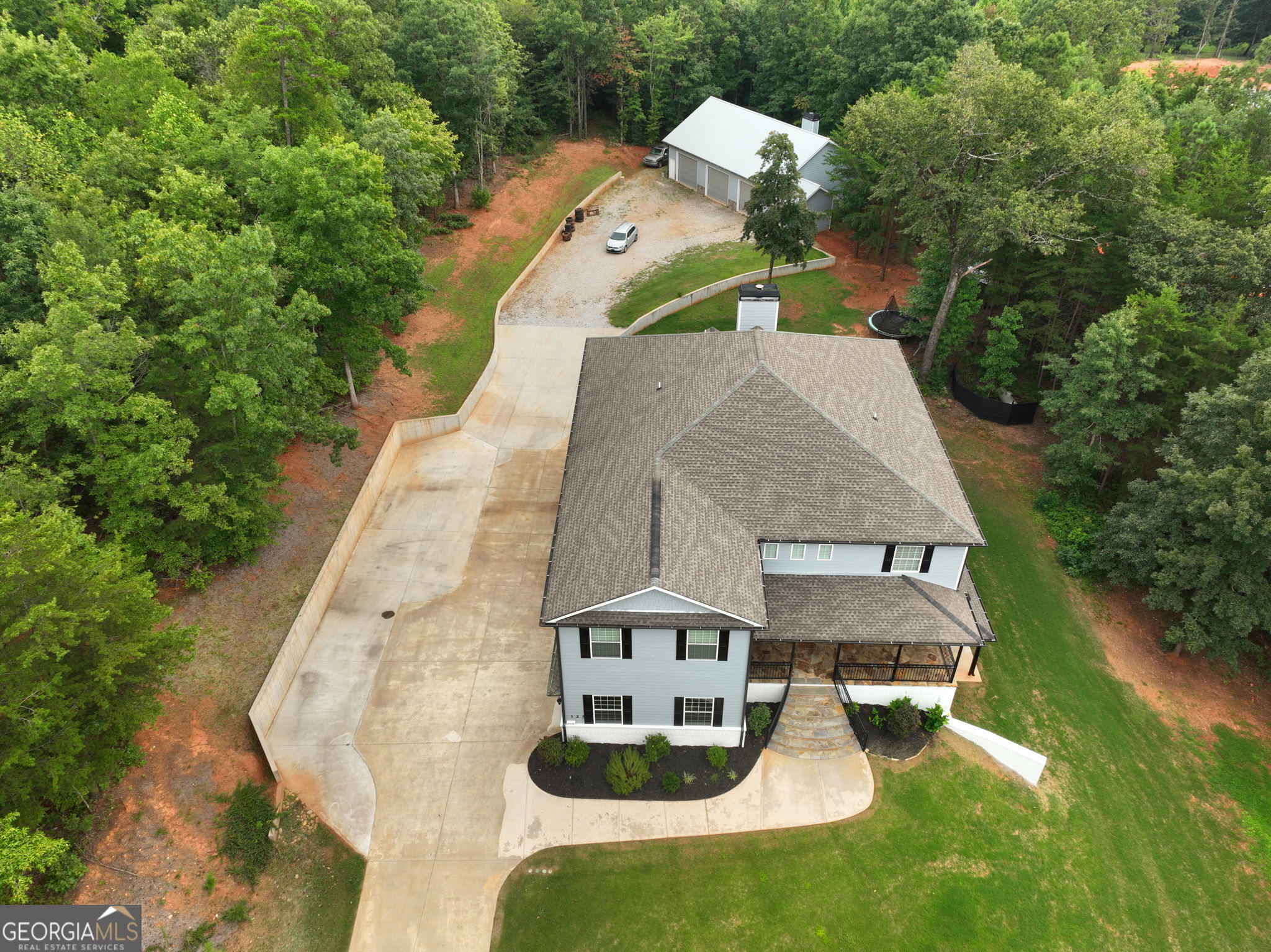 125 Iron Horse Trail Lula, GA 30554 - Photo 80 of 86 an aerial view of a house with outdoor space
