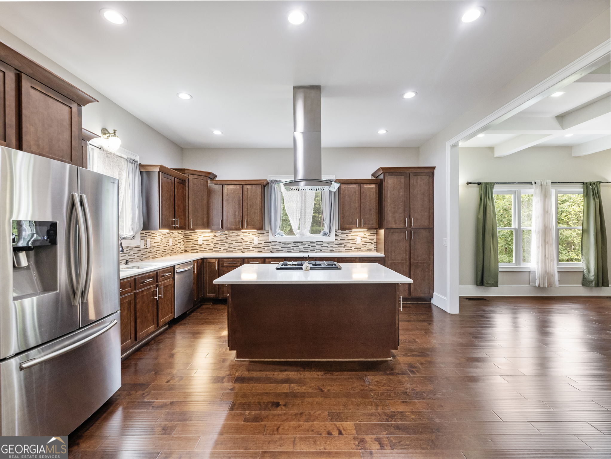 125 Iron Horse Trail Lula, GA 30554 - Photo 8 of 86 a view of kitchen with stainless steel appliances wooden floor and large window