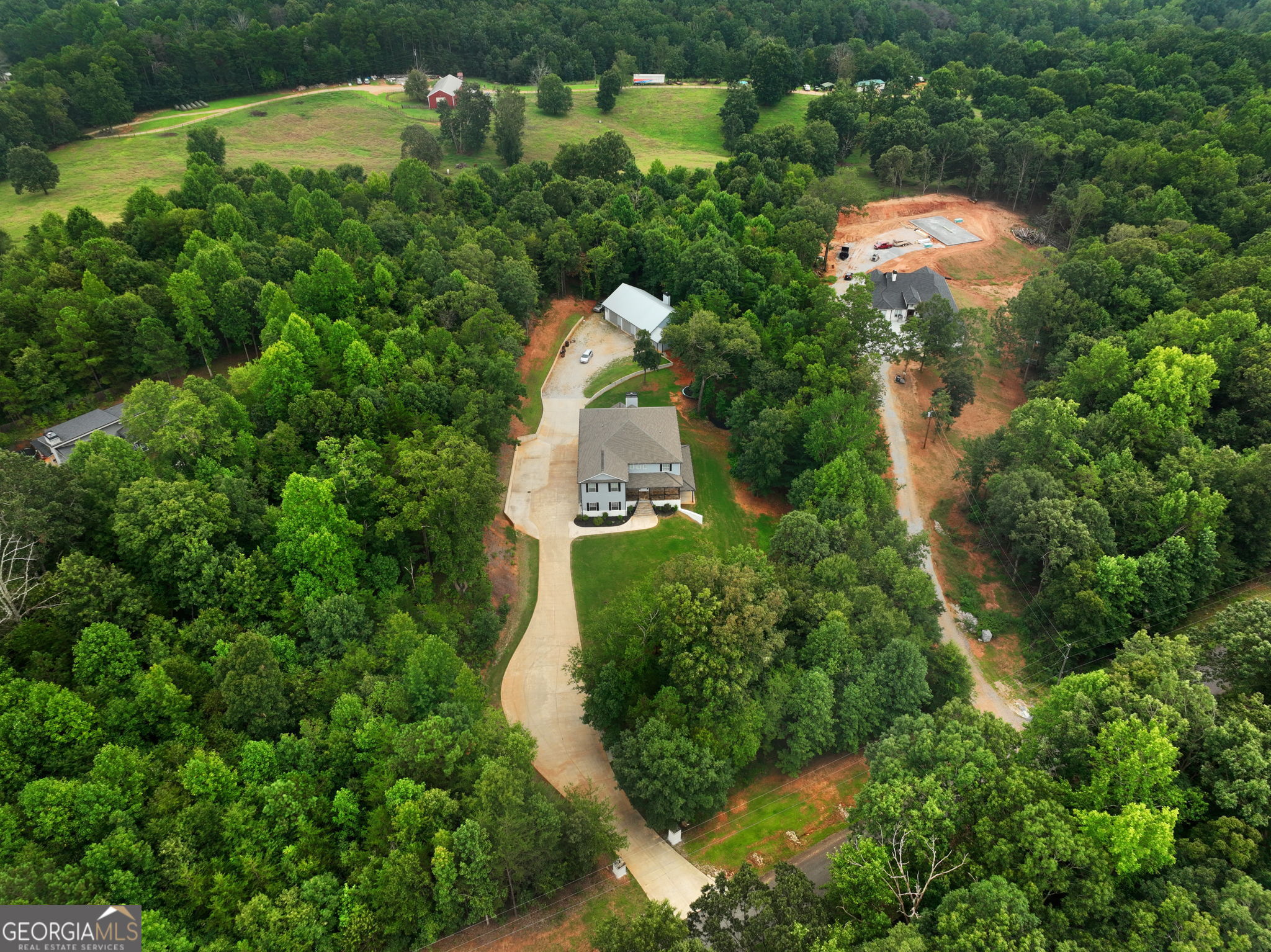 125 Iron Horse Trail Lula, GA 30554 - Photo 84 of 86 an aerial view of residential houses with outdoor space and trees all around