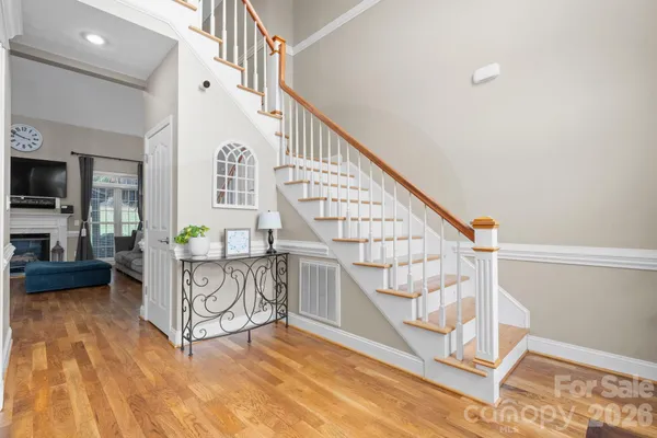 a view of entryway with wooden floor