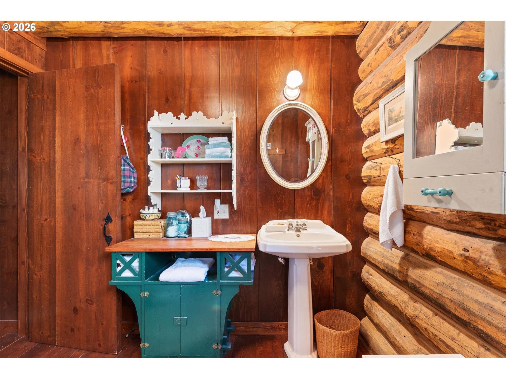 64782 Alder Slope Road Enterprise, OR 97828 - Photo 17 of 48 a bathroom with a sink and a mirror