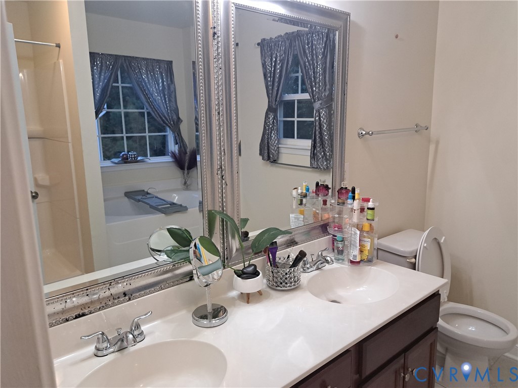 5347 Meadoway Road North Chesterfield, VA 23234 - Photo 22 of 31 Master bathroom. Double vanity with integrated sin