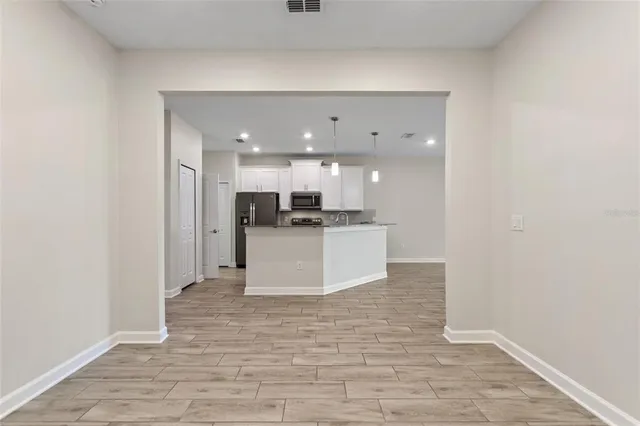 a view of kitchen with wooden floor