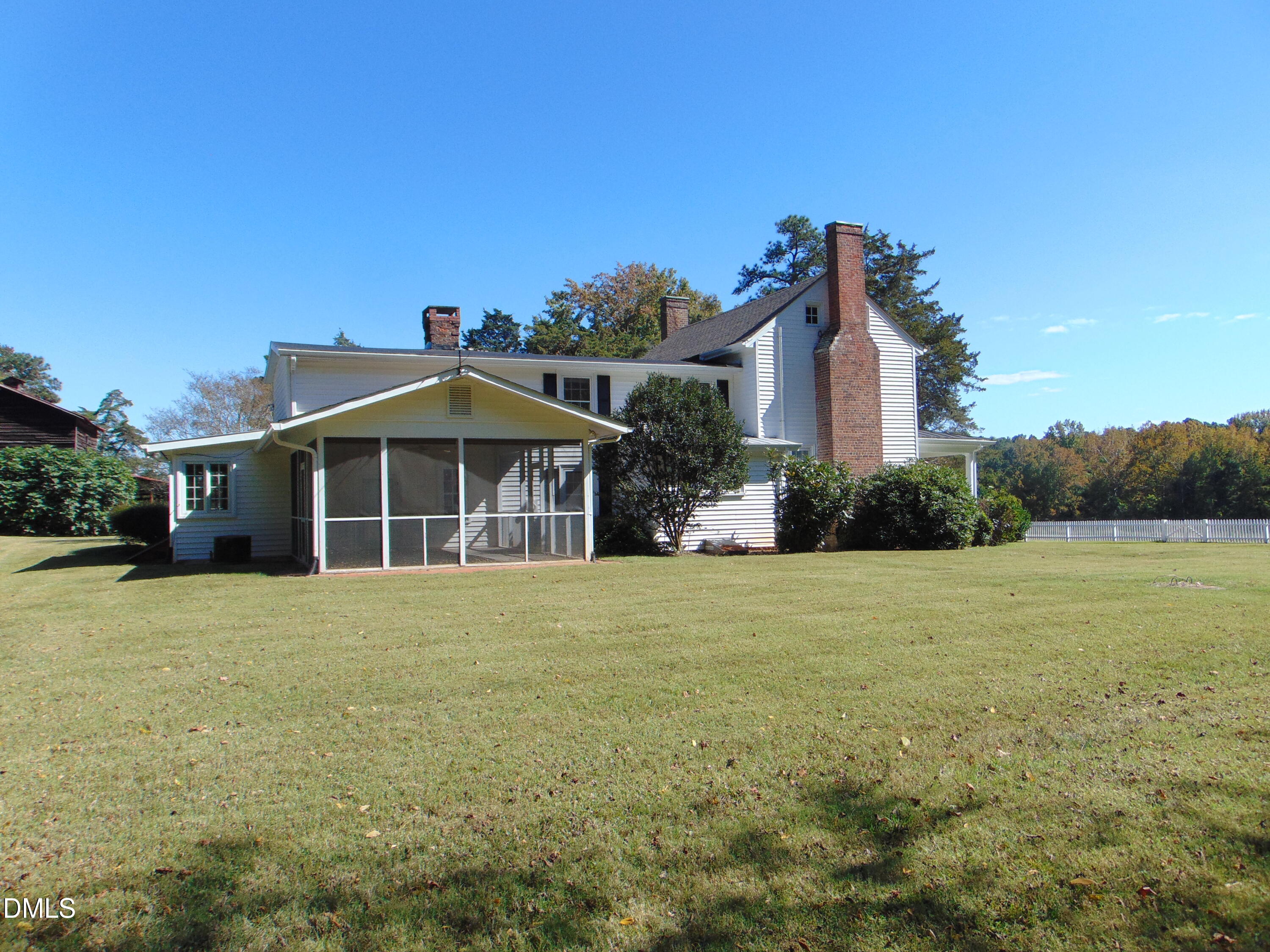4067 Chewning Road Oxford, NC 27565 - Photo 38 of 82 a front view of a house with a garden