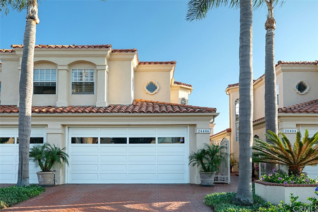 24486 Alta Vista Drive Dana Point, CA 92629 - Photo 15 of 15 a front view of a house with a yard