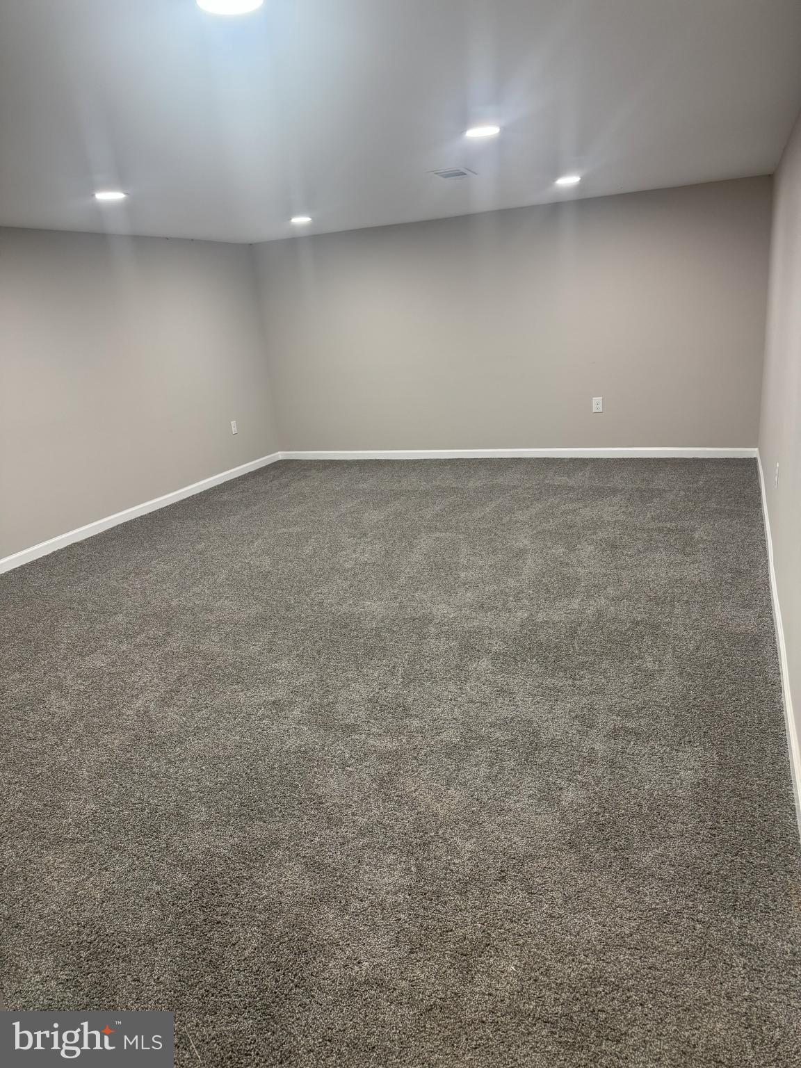408 Cherry Hill Road Street, MD 21154 - Photo 14 of 17 an empty room with a natural light