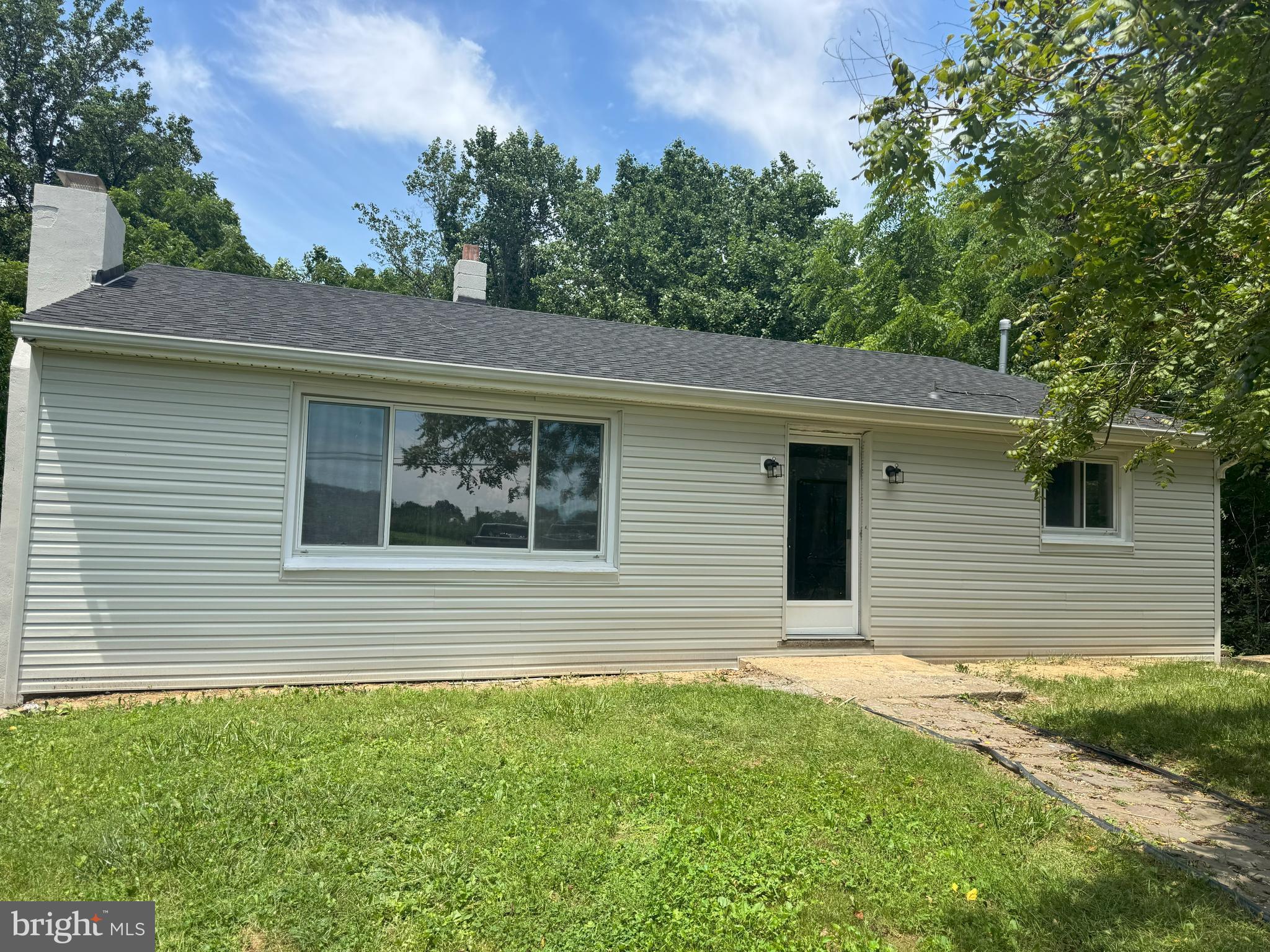 408 Cherry Hill Road Street, MD 21154 - Photo 17 of 17 a view of a house with a backyard