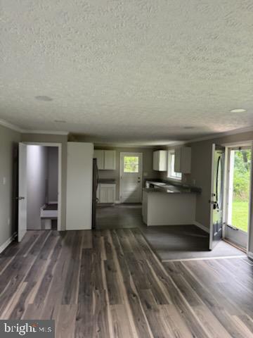 408 Cherry Hill Road Street, MD 21154 - Photo 3 of 17 a view of empty room with wooden floor and fan