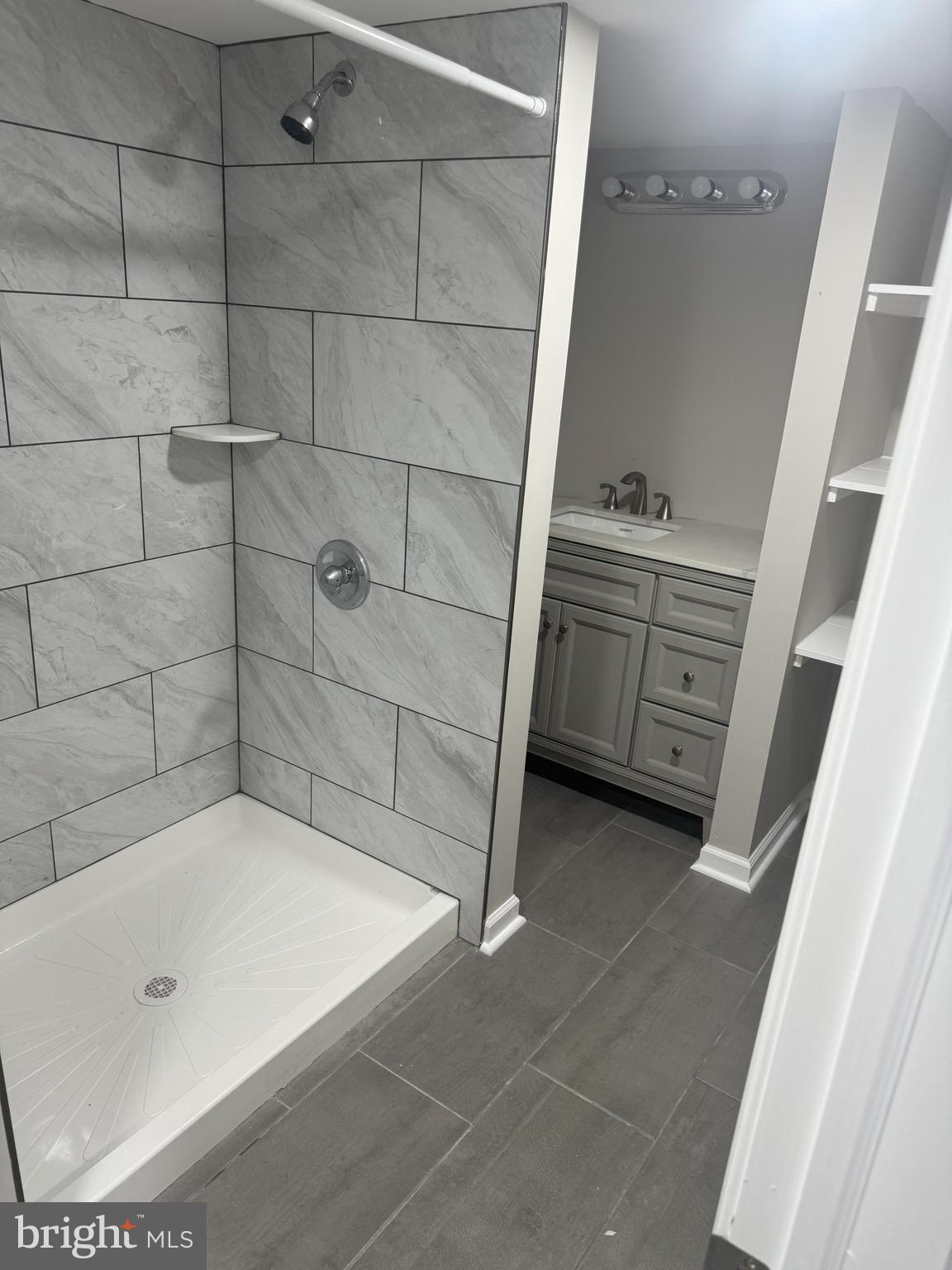 408 Cherry Hill Road Street, MD 21154 - Photo 5 of 17 a bathroom with a tub and a sink