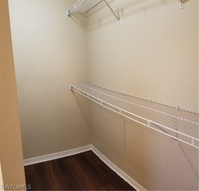 8149 Anhinga Road Fort Myers, FL 33967 - Photo 7 of 14 a view of a room with racks on the wall