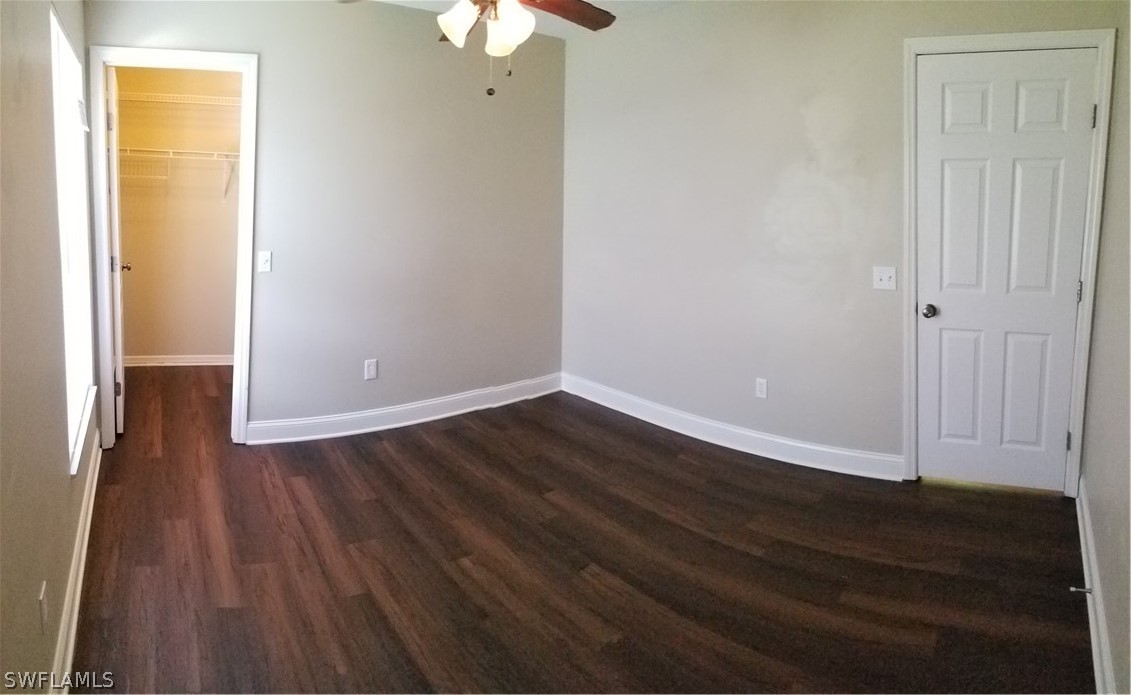 8149 Anhinga Road Fort Myers, FL 33967 - Photo 10 of 14 wooden floor in an empty room