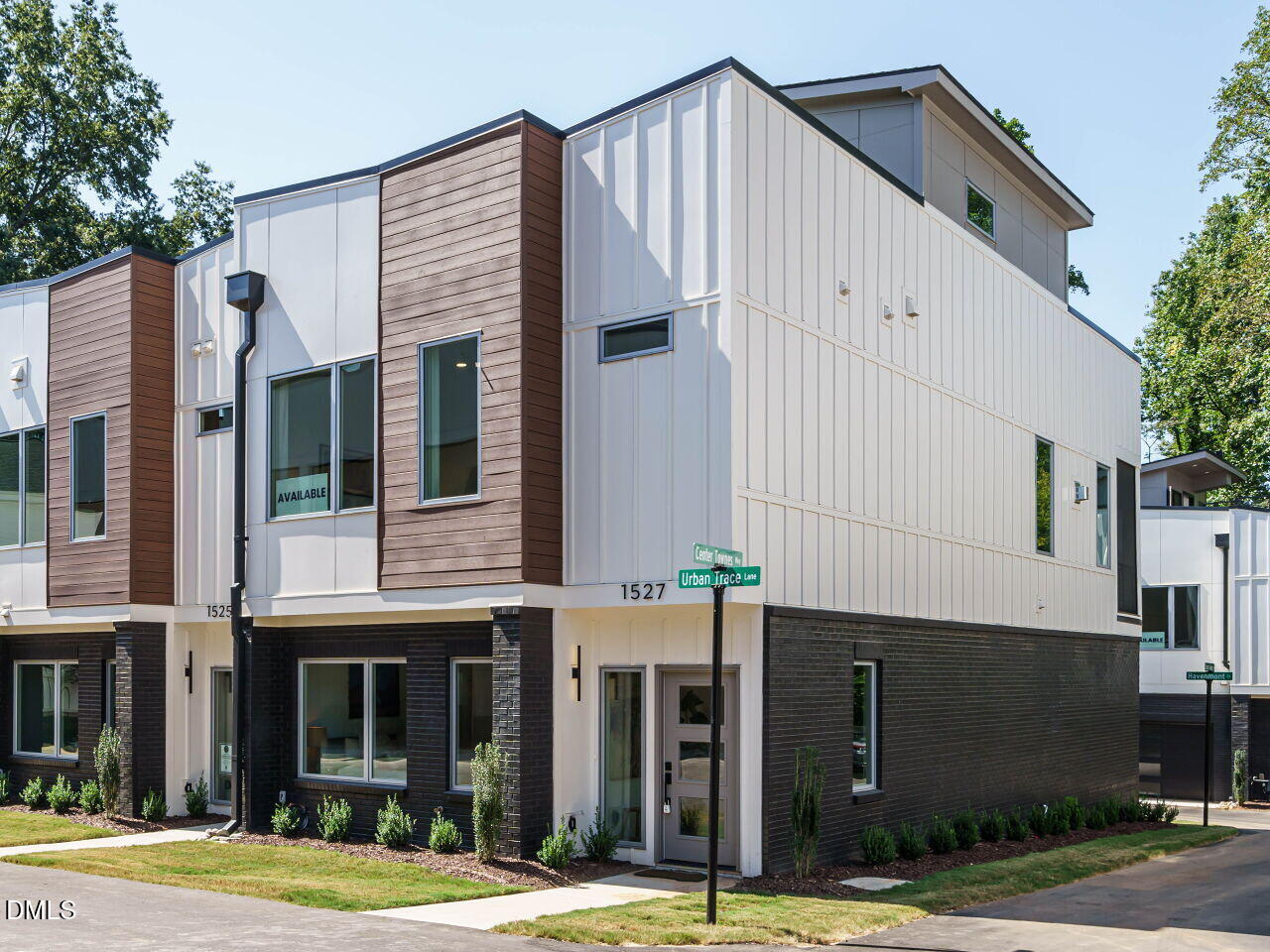 1527 Urban Trace Lane Raleigh, NC 27608 - Photo 2 of 37 a view of a building with a street