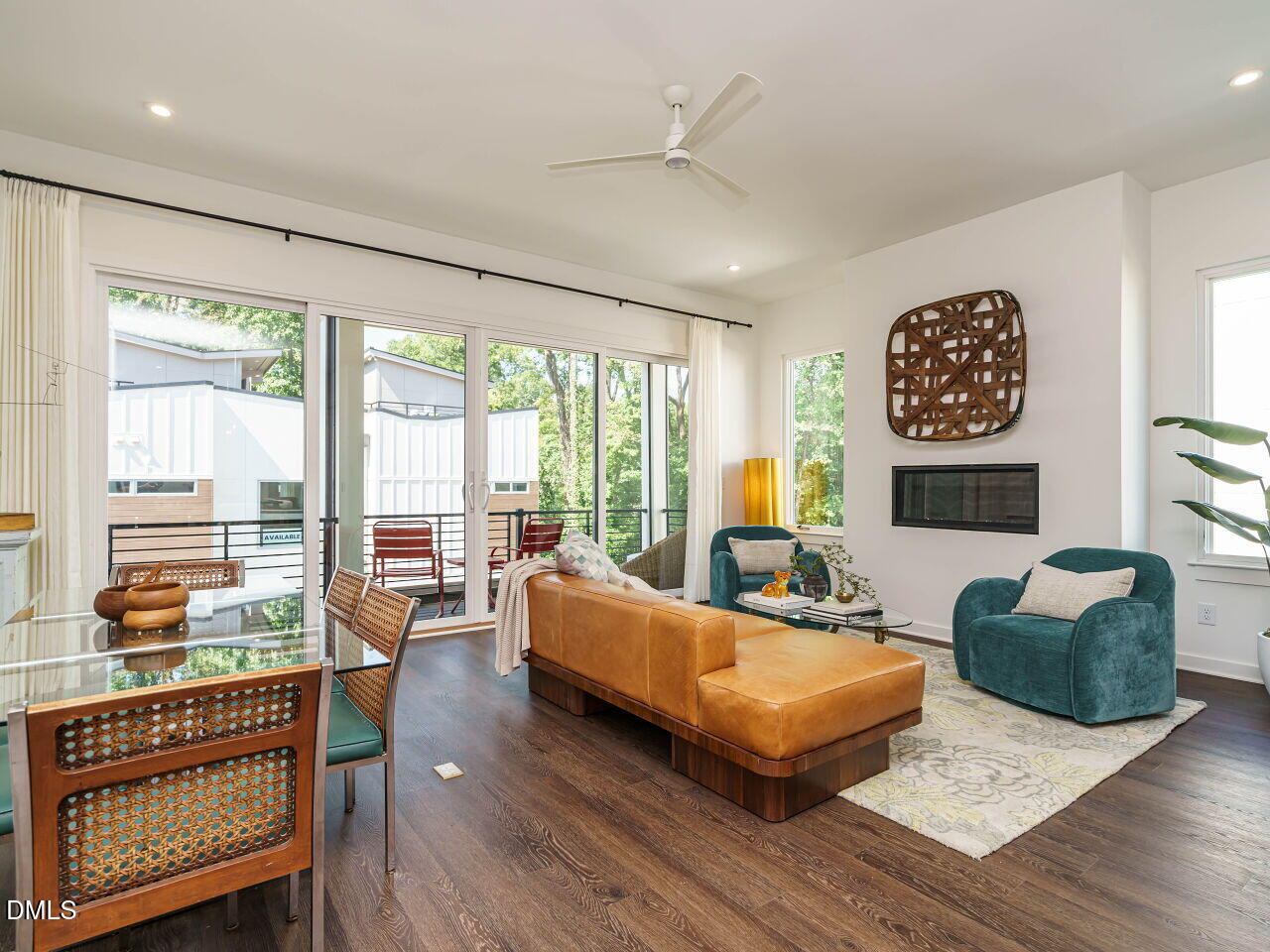 1527 Urban Trace Lane Raleigh, NC 27608 - Photo 9 of 37 a living room with furniture and a floor to ceiling window