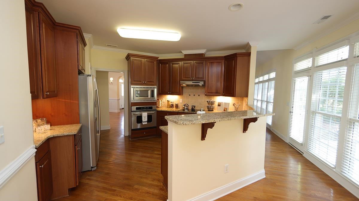 263 Waterville Street Raleigh, NC 27603 - Photo 5 of 23 Elevated Breakfast Bar to Enjoy time in the Kitchen...Just add Your Favorite Comfortable Stools Chef's Kitchen