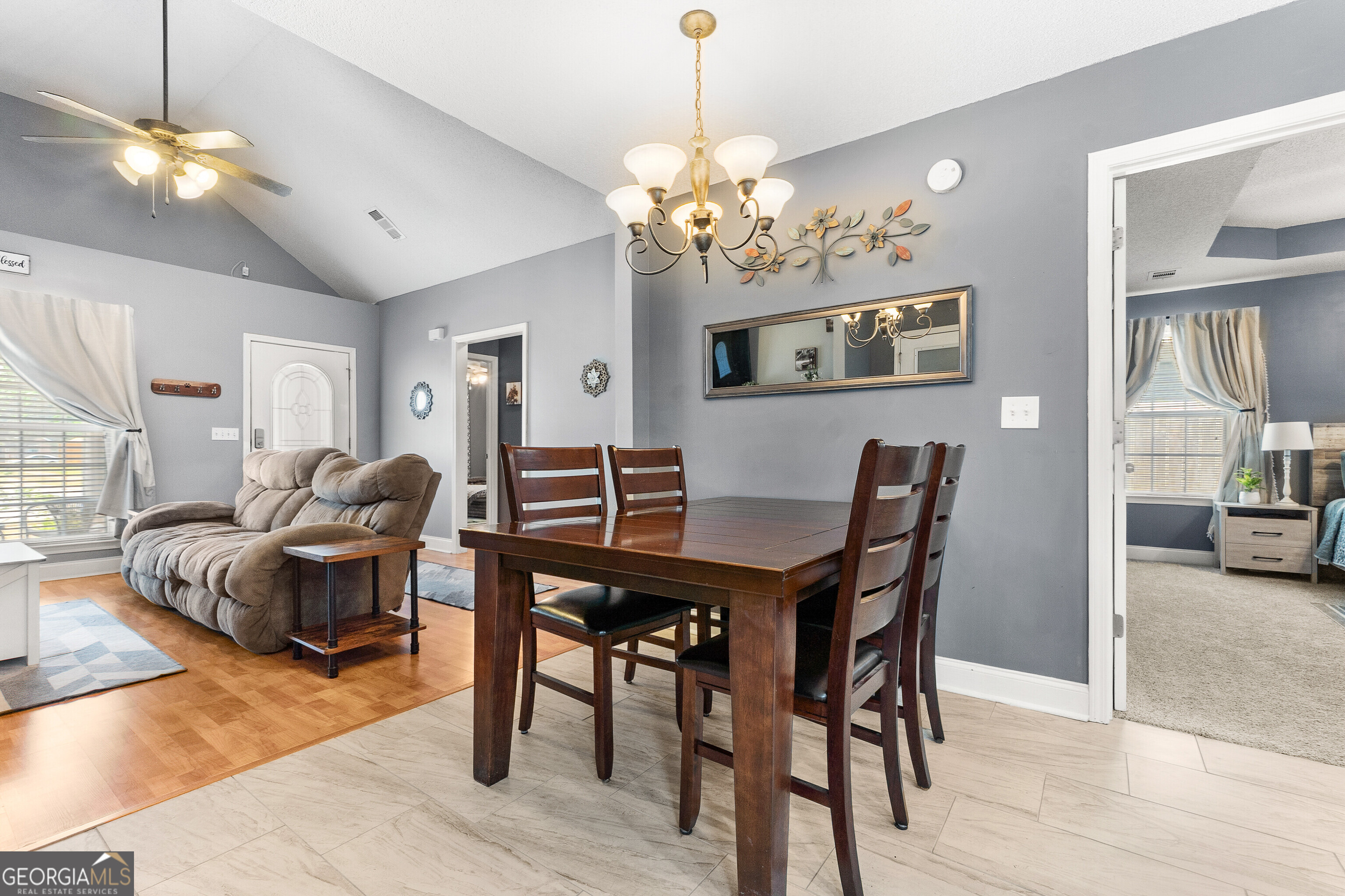 418 Covington Cove Byron, GA 31008 - Photo 12 of 47 a view of a dining room with furniture and chandelier