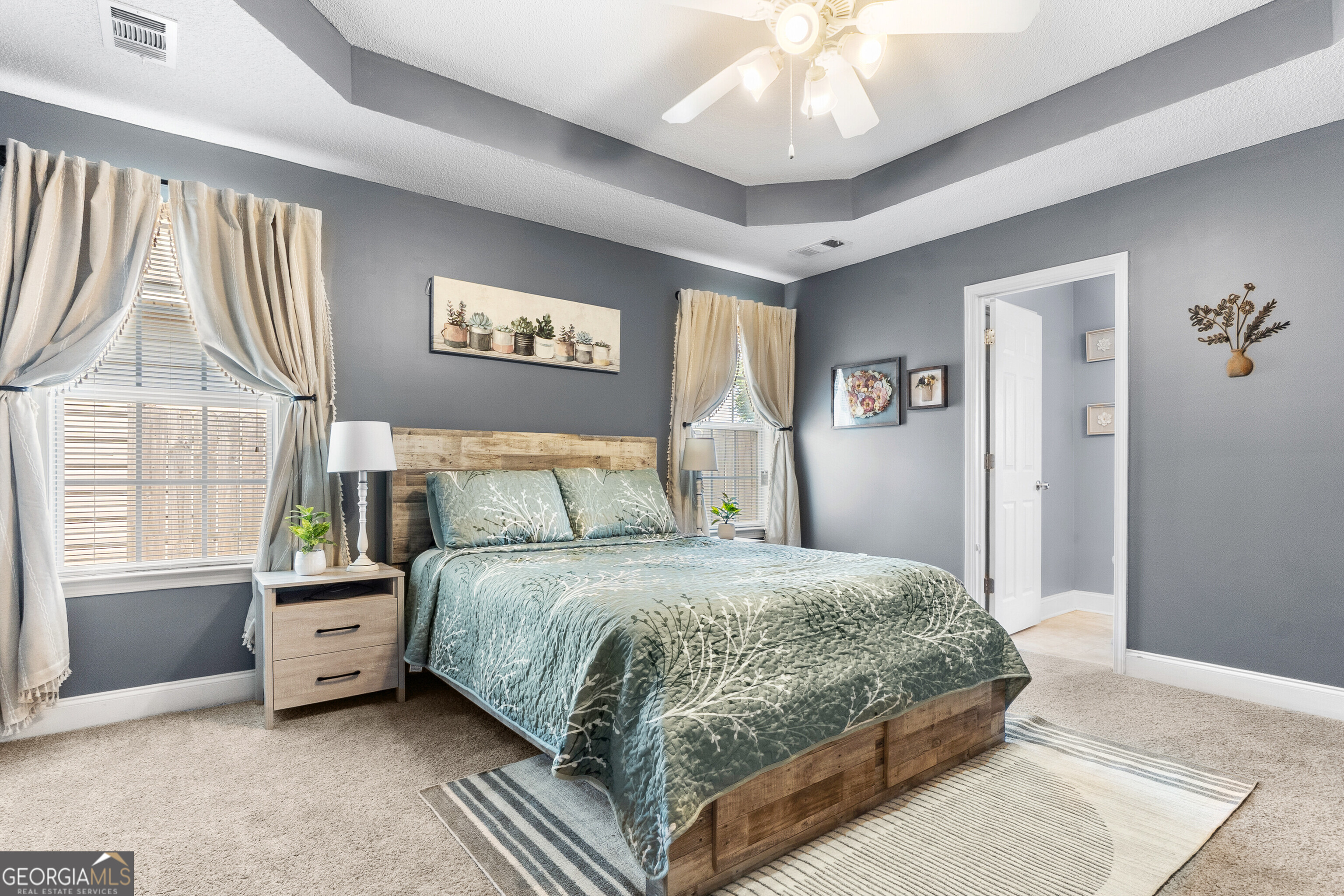 418 Covington Cove Byron, GA 31008 - Photo 24 of 47 a bedroom with a bed and a window