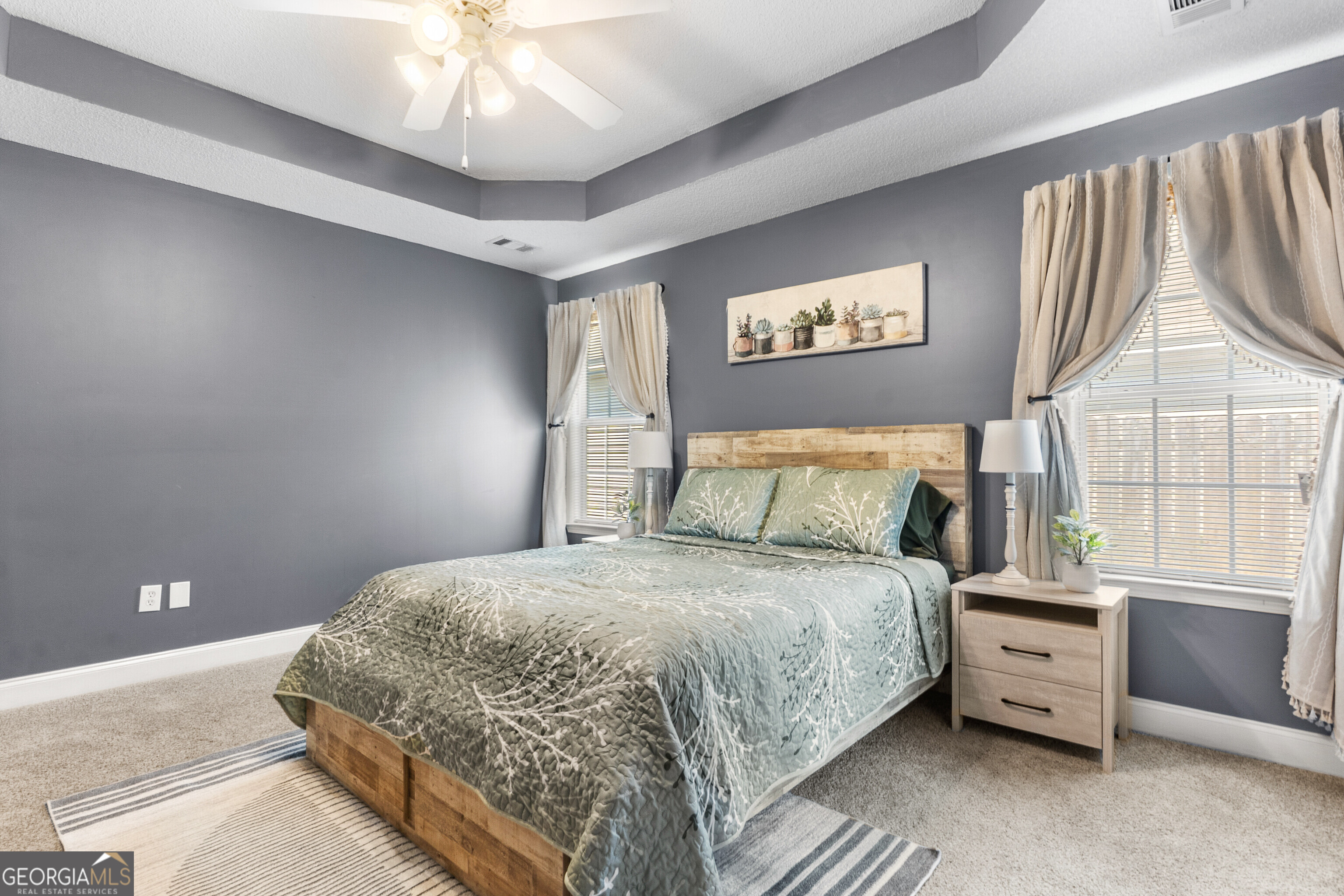 418 Covington Cove Byron, GA 31008 - Photo 25 of 47 a bedroom with a large bed and a window