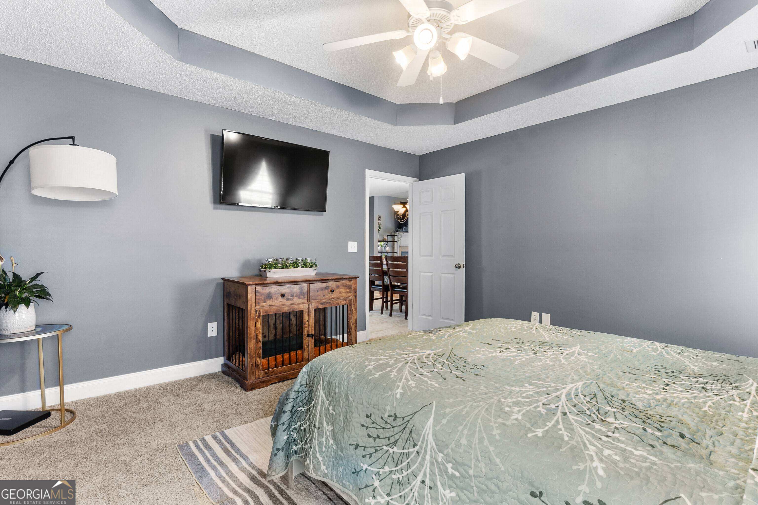 418 Covington Cove Byron, GA 31008 - Photo 26 of 47 a bedroom with a bed and a television