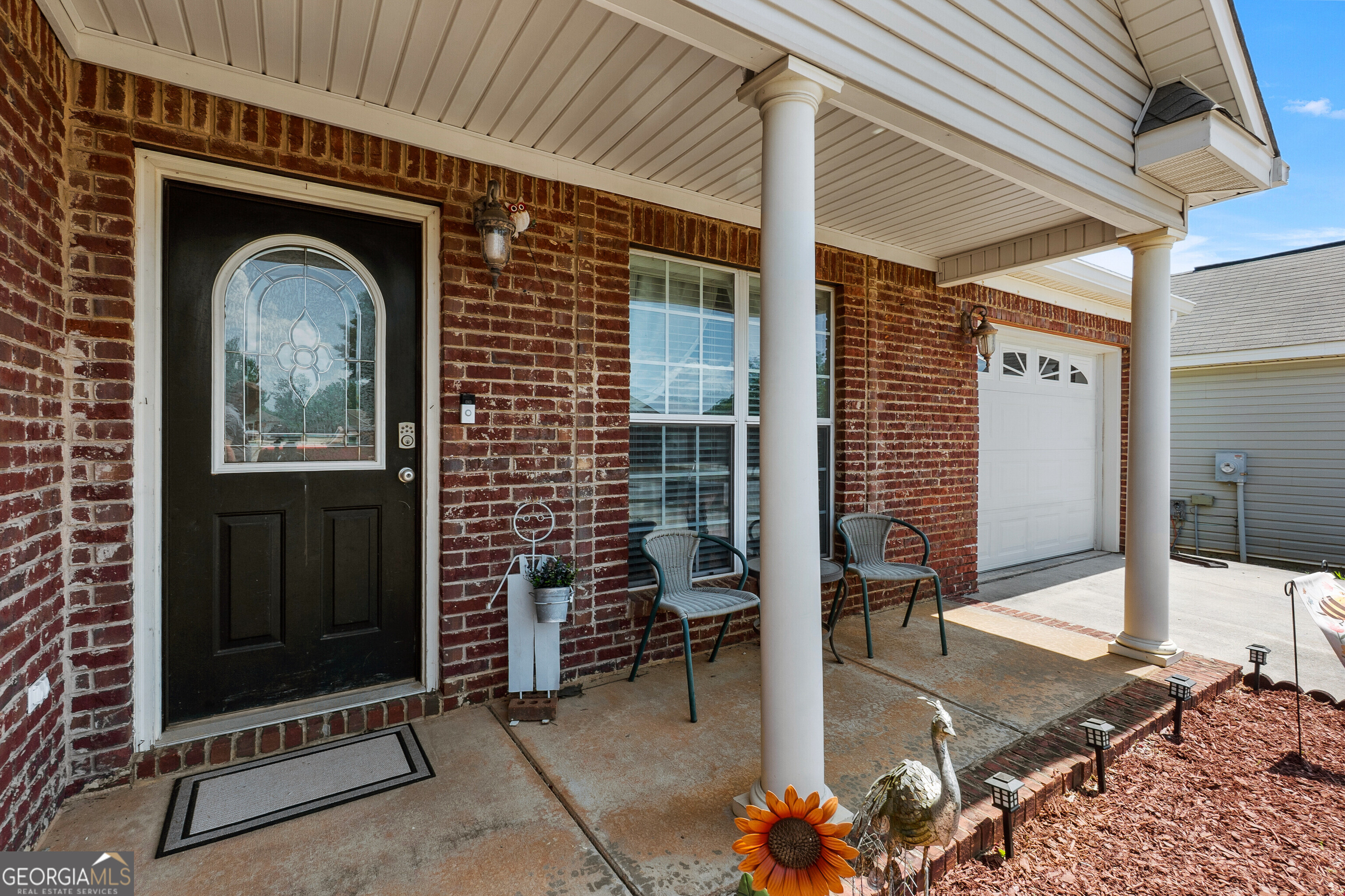 418 Covington Cove Byron, GA 31008 - Photo 4 of 47 a front view of a house with outdoor seating