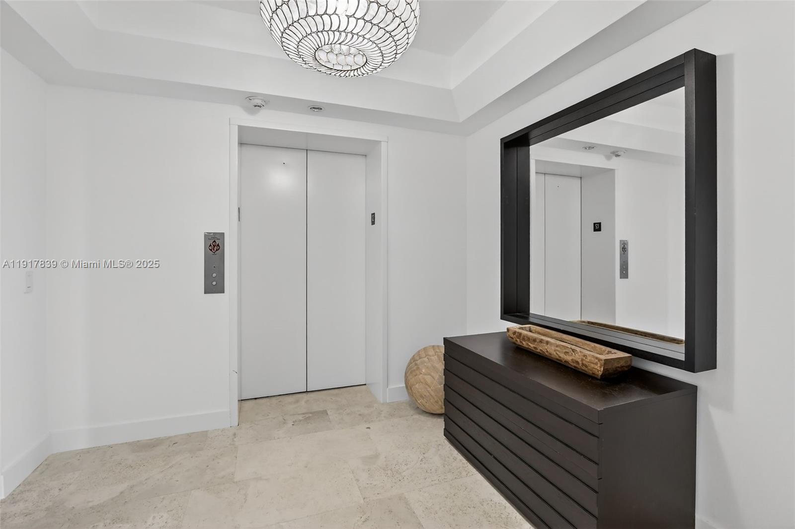 6000 Island Boulevard, Unit 1208 Aventura, FL 33160 - Photo 8 of 50 a view of room with a wooden floor