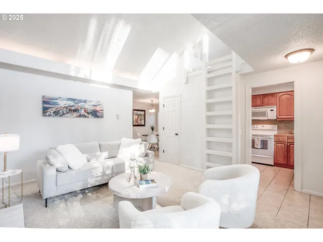 a living room with furniture and a table