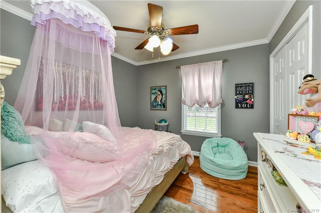 1108 Pinewood Road Rock Hill, SC 29730 - Photo 23 of 26 a bedroom with a bed dresser and a window