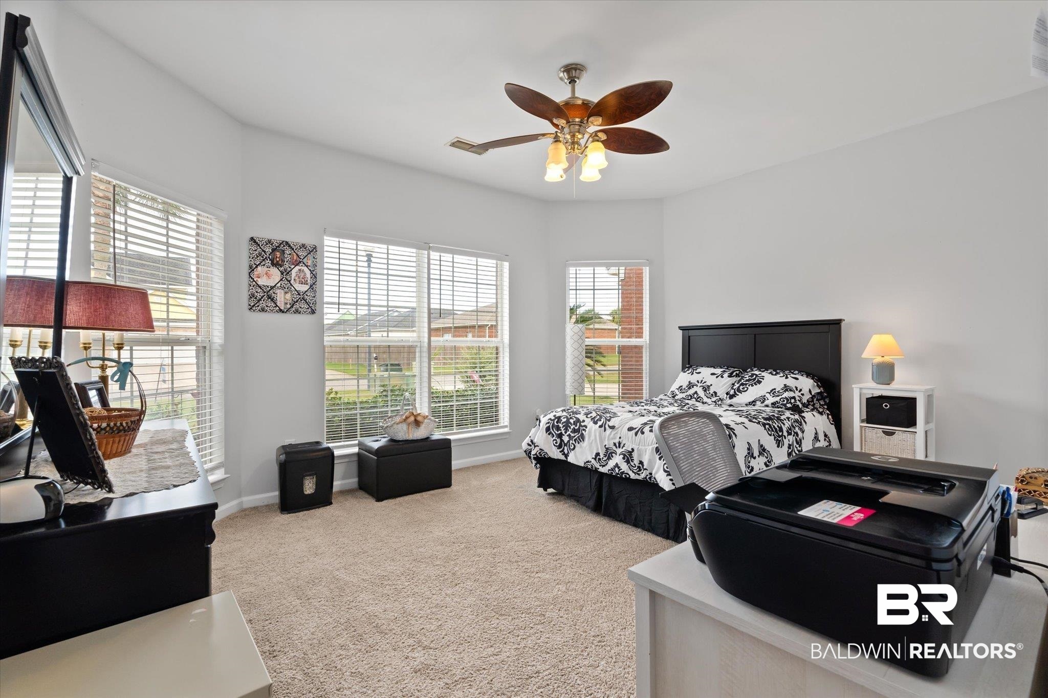 3876 Emerille Drive Foley, AL 36535 - Photo 18 of 31 Bedroom with multiple windows, carpet, and ceiling fan